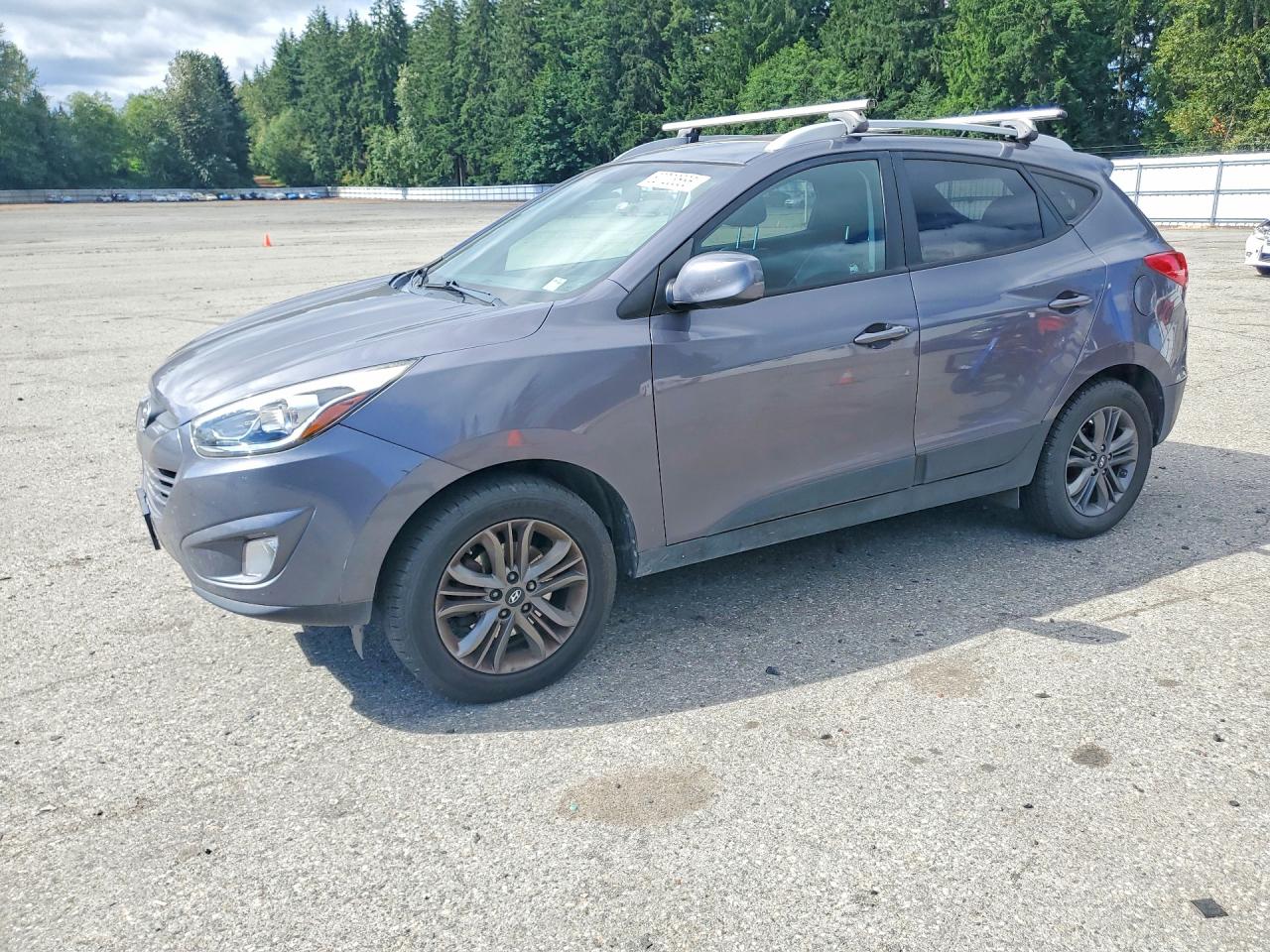 KM8JU3AG6FU055409 · 2015 HYUNDAI TUCSON