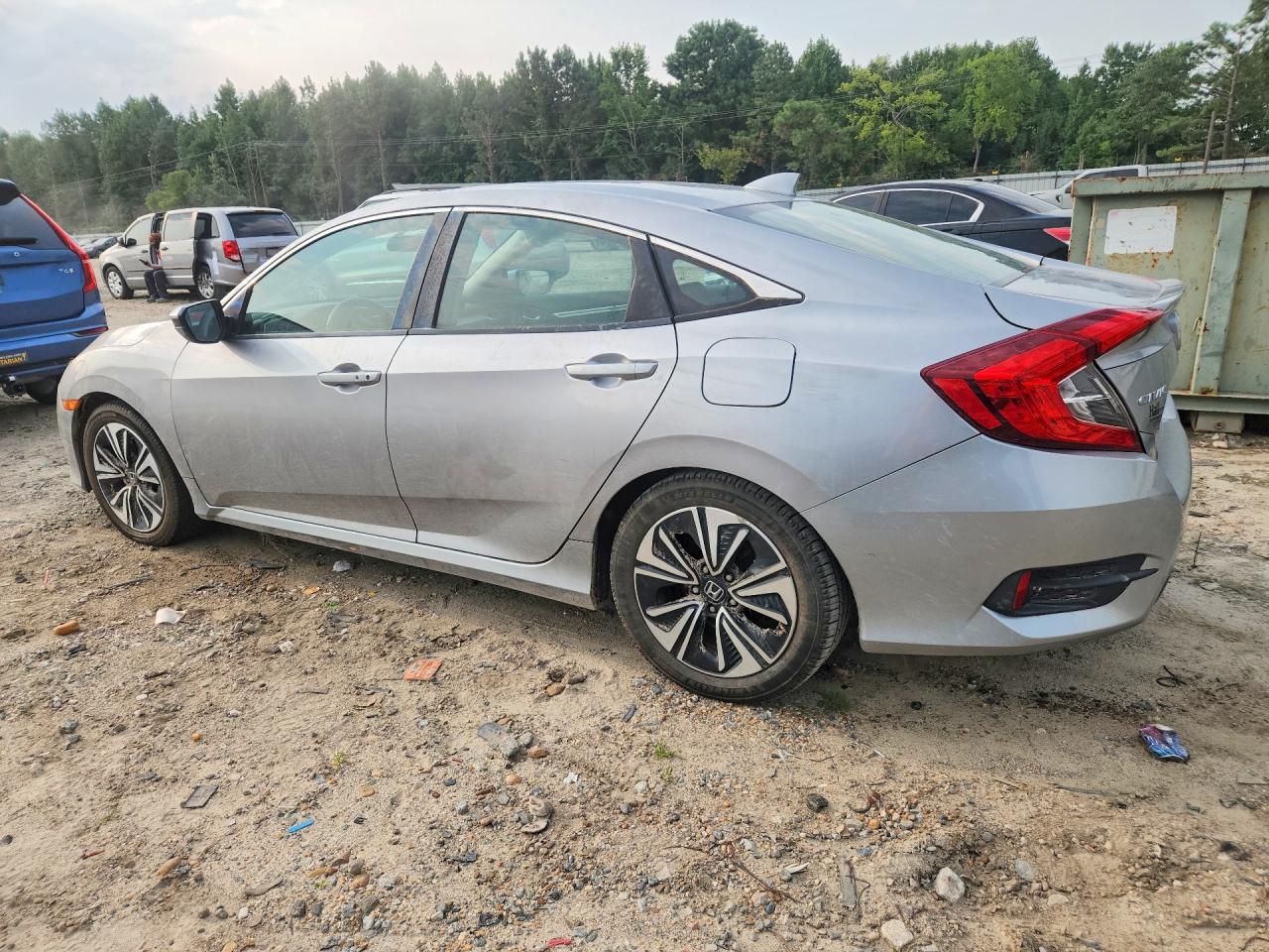 19XFC1F38GE017641 · 2016 HONDA CIVIC · 2/12