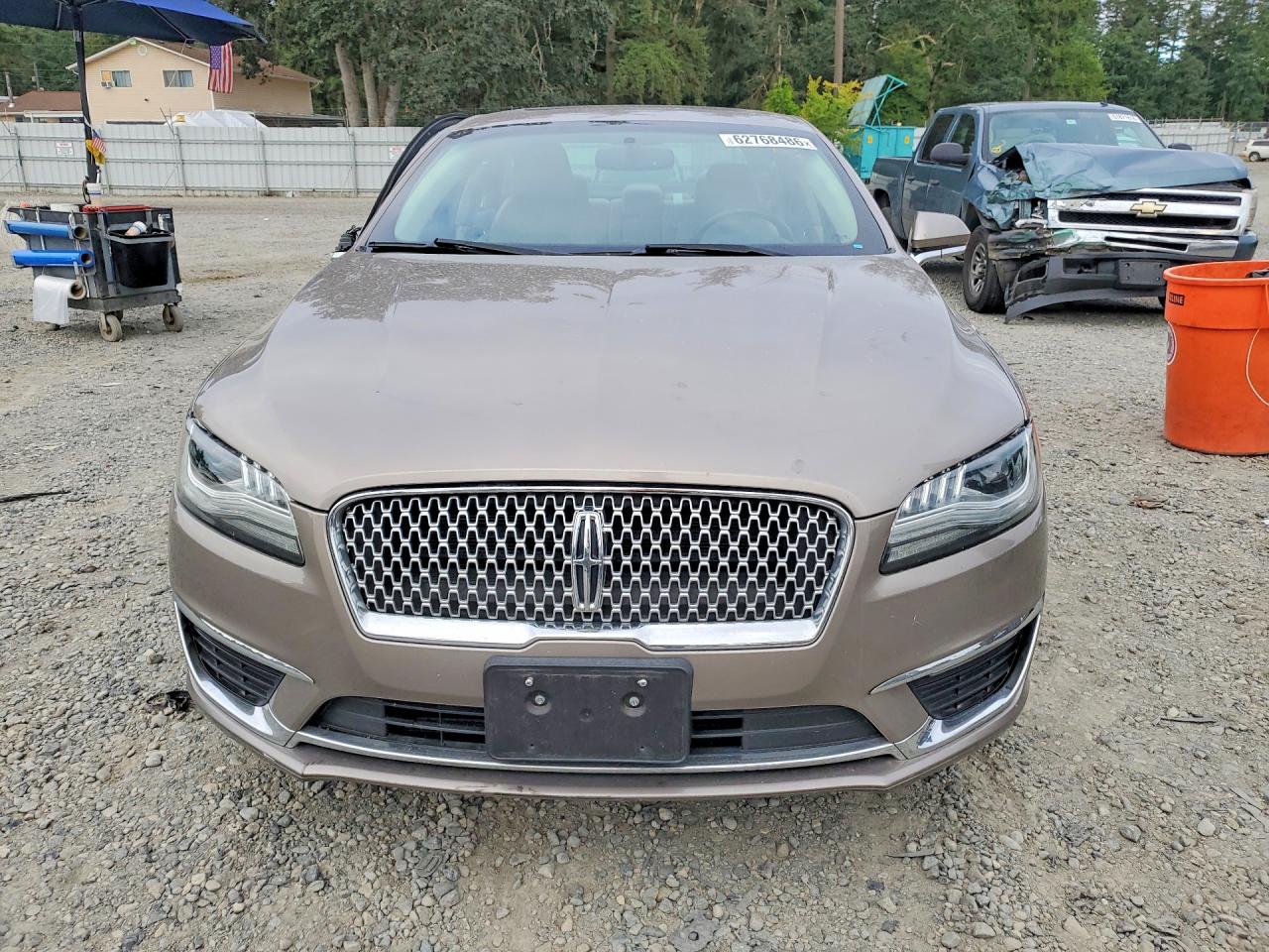 3LN6L5MU1JR615858 · 2018 LINCOLN MKZ · 4/11