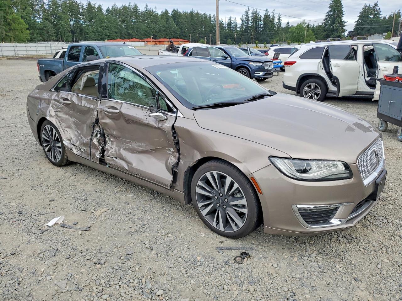 3LN6L5MU1JR615858 · 2018 LINCOLN MKZ · 3/11