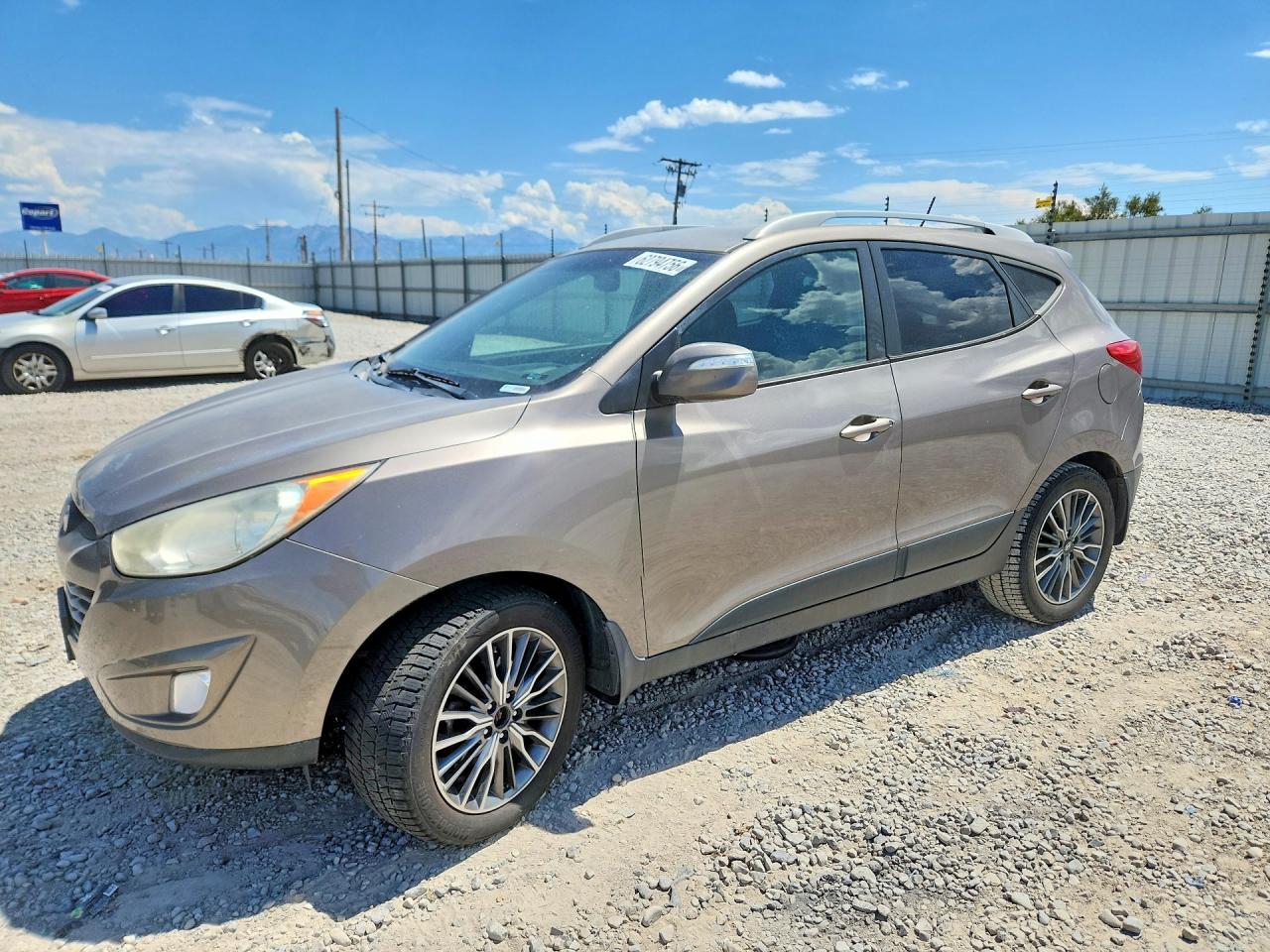KM8JUCACXDU574599 · 2013 HYUNDAI TUCSON