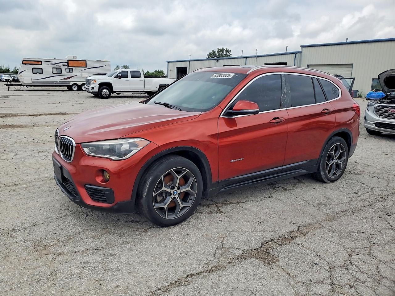 WBXHU7C3XJ5H45516 · 2018 BMW X1