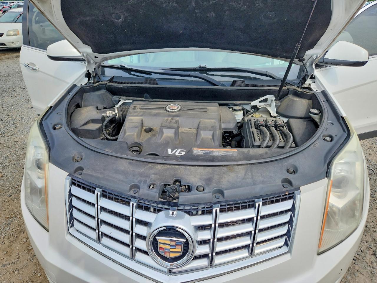 3GYFNBE31ES642926 · 2014 CADILLAC SRX · 12/13