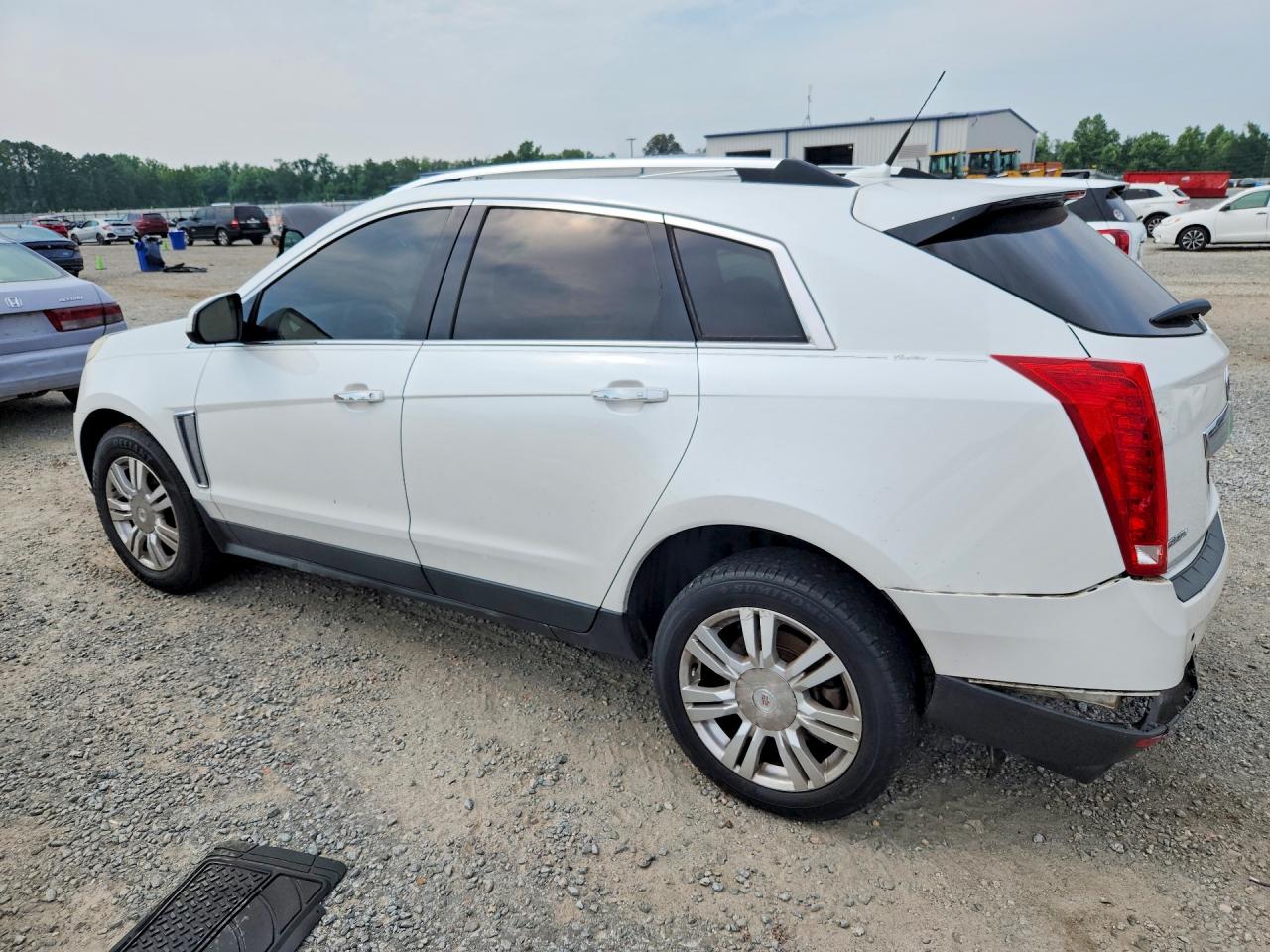3GYFNBE31ES642926 · 2014 CADILLAC SRX · 2/13