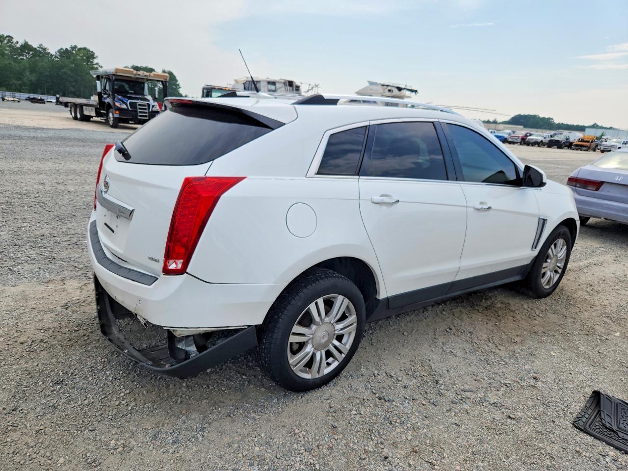 3GYFNBE31ES642926 · 2014 CADILLAC SRX · 3/13