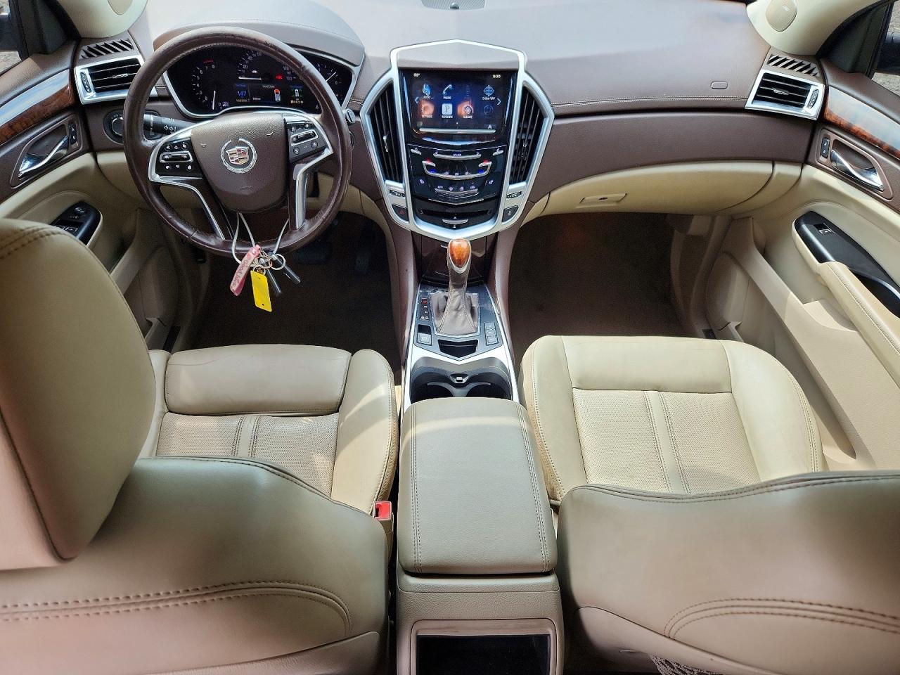 3GYFNBE31ES642926 · 2014 CADILLAC SRX · 8/13