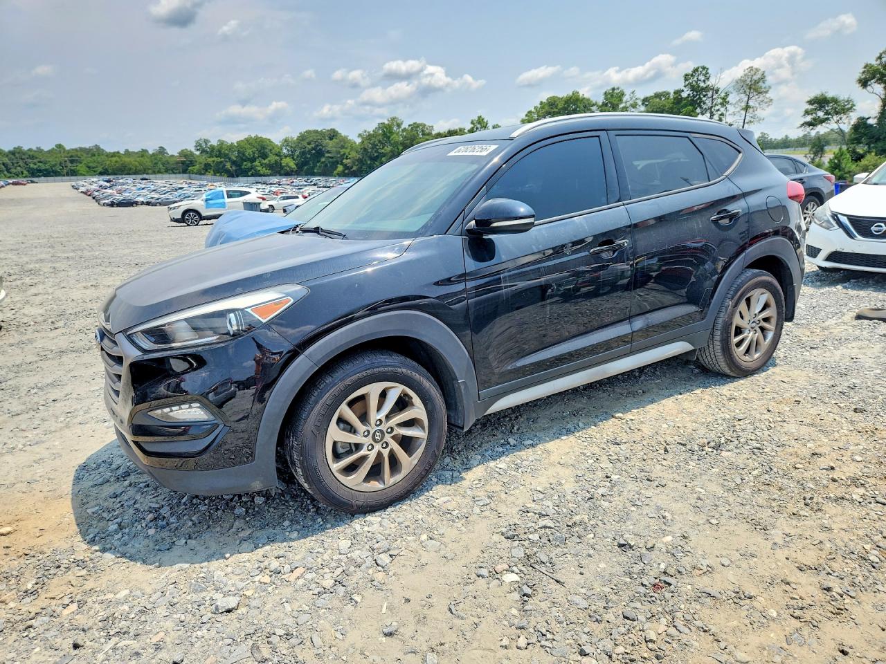 KM8J33A46JU648303 · 2018 HYUNDAI TUCSON