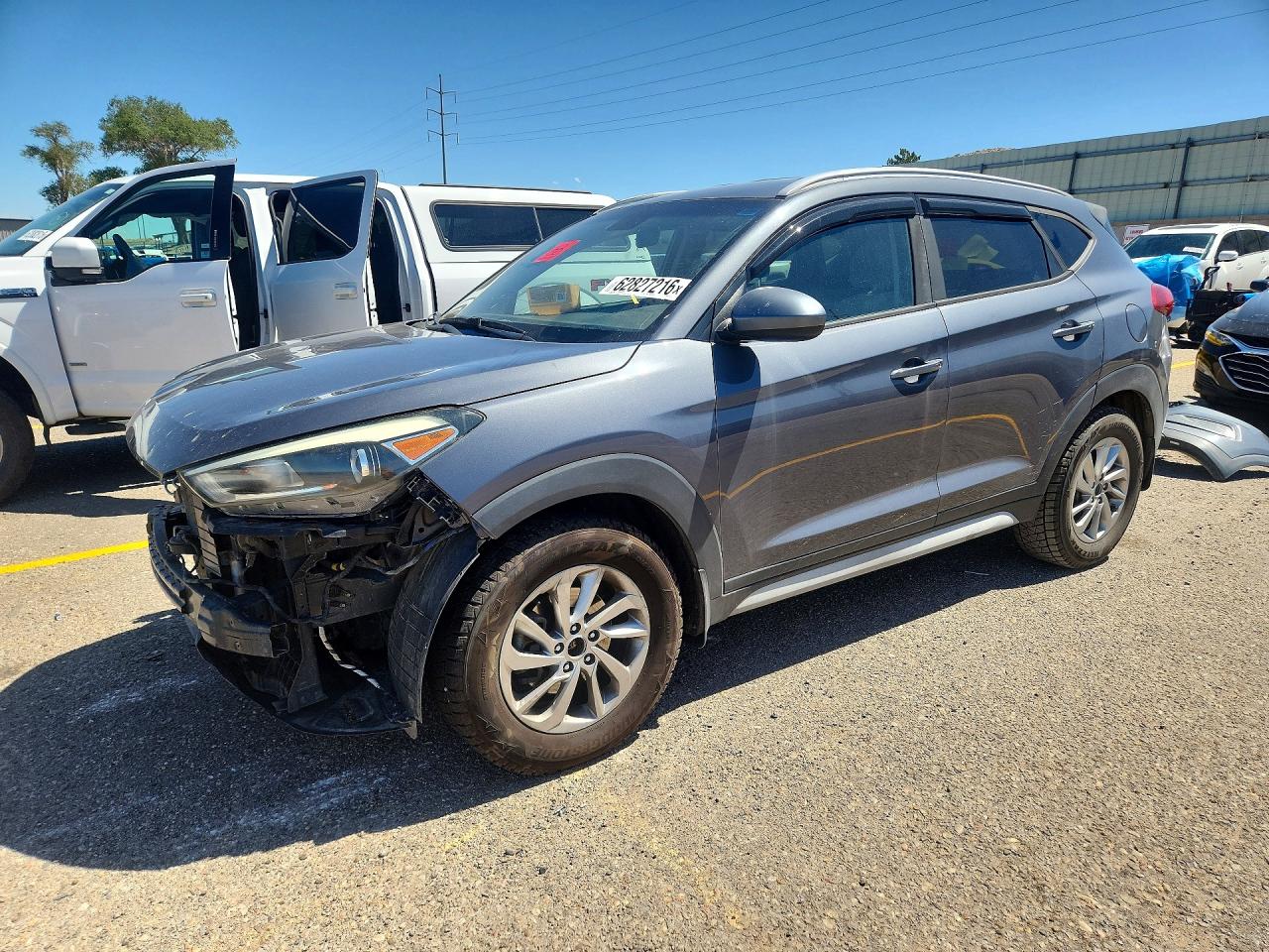 KM8J3CA46JU730211 · 2018 HYUNDAI TUCSON