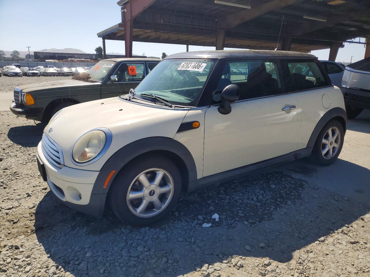 WMWMF335X9TU75740 · 2009 MINI COOPER