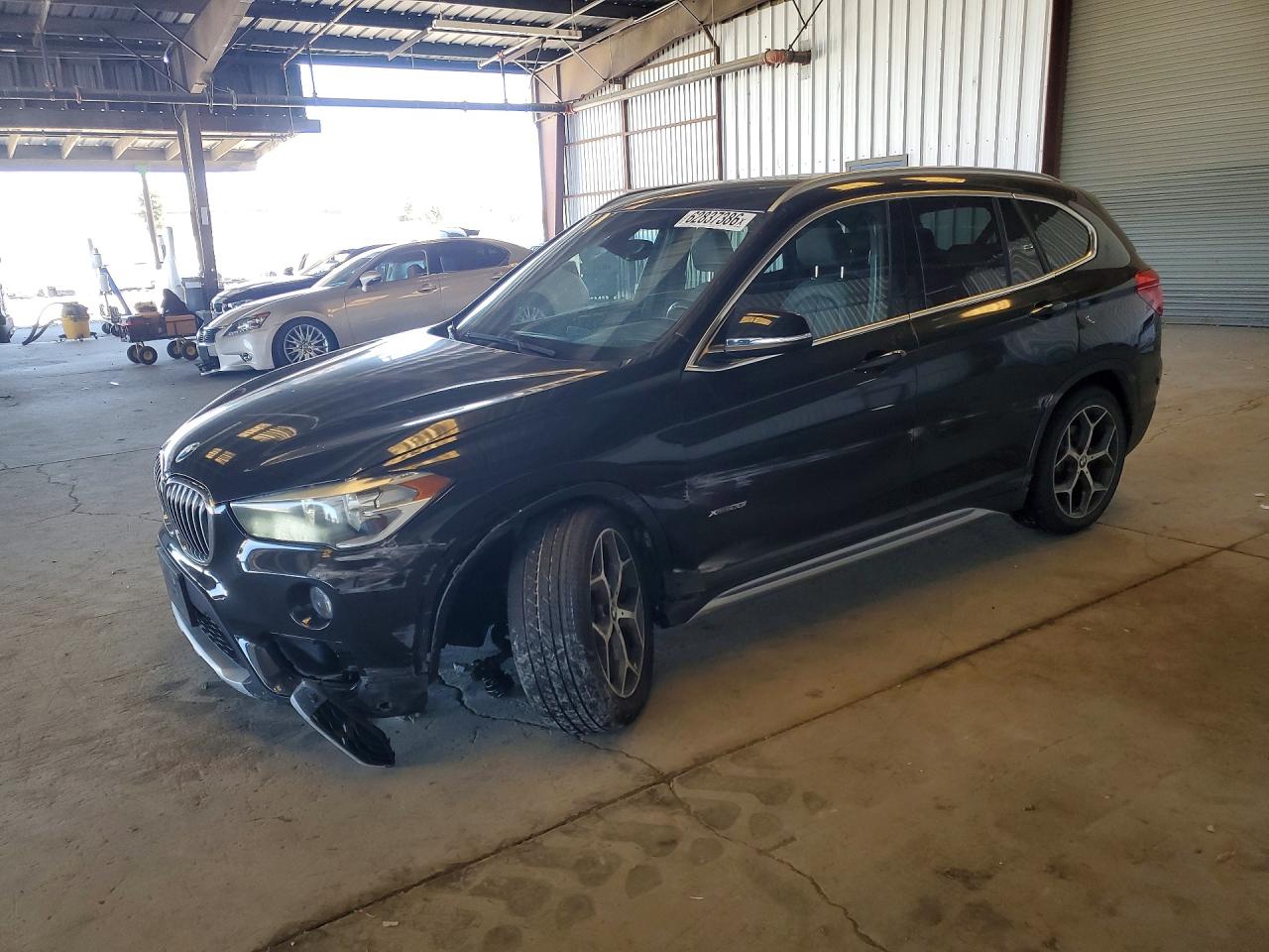 WBXHT3C31GP884035 · 2016 BMW X1