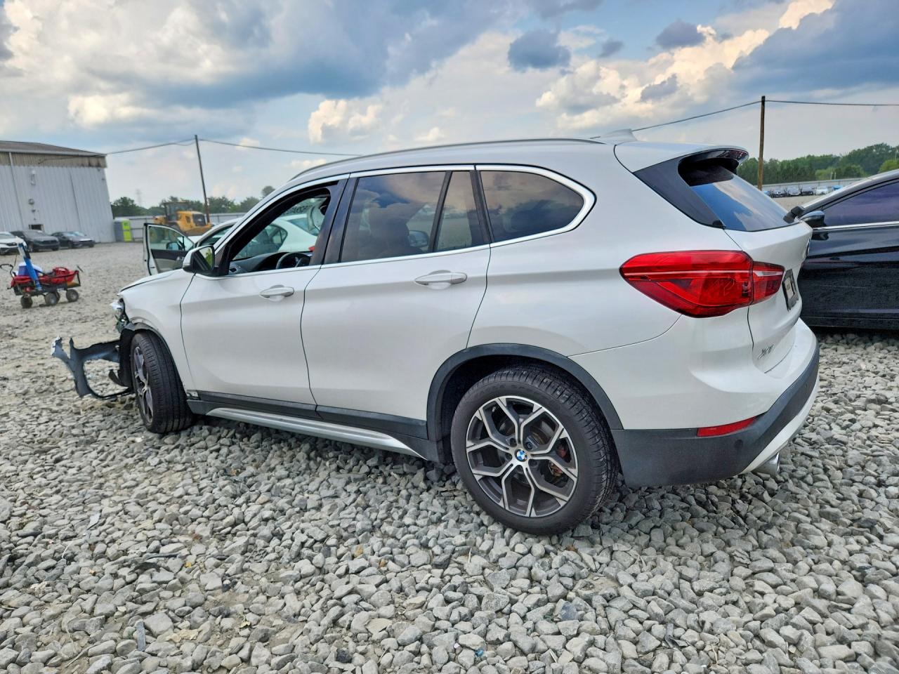 WBXJG9C04M3M76355 · 2021 BMW X1 · 2/13