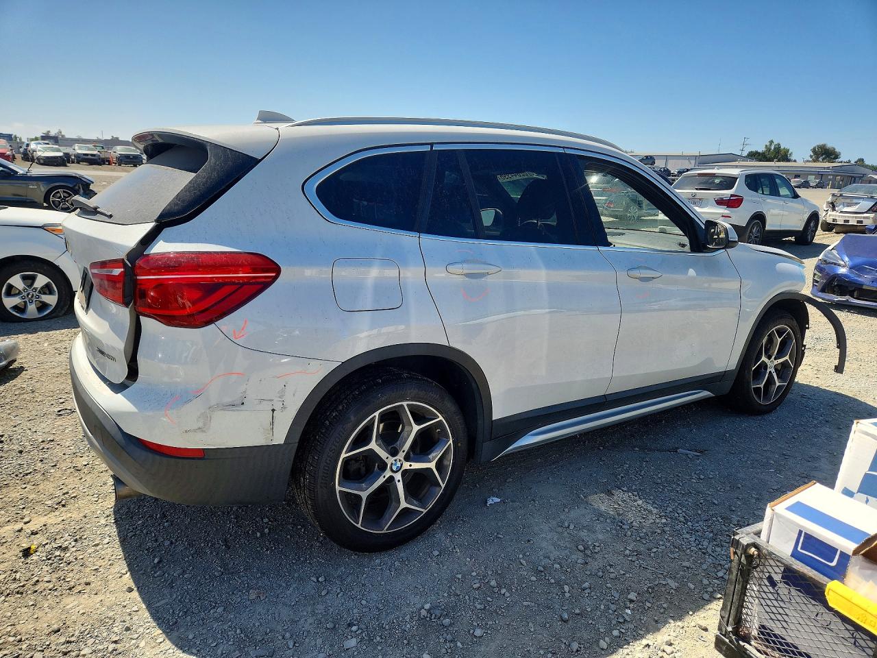 WBXHU7C35J5L08889 · 2018 BMW X1 · 3/14