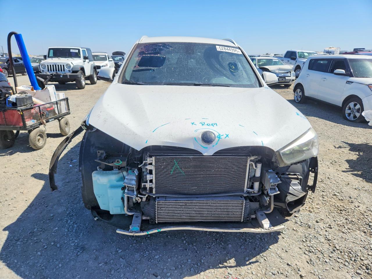 WBXHU7C35J5L08889 · 2018 BMW X1 · 5/14