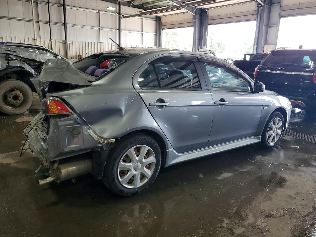 JA32U2FU2FU008717 · 2015 MITSUBISHI LANCER · 3/13