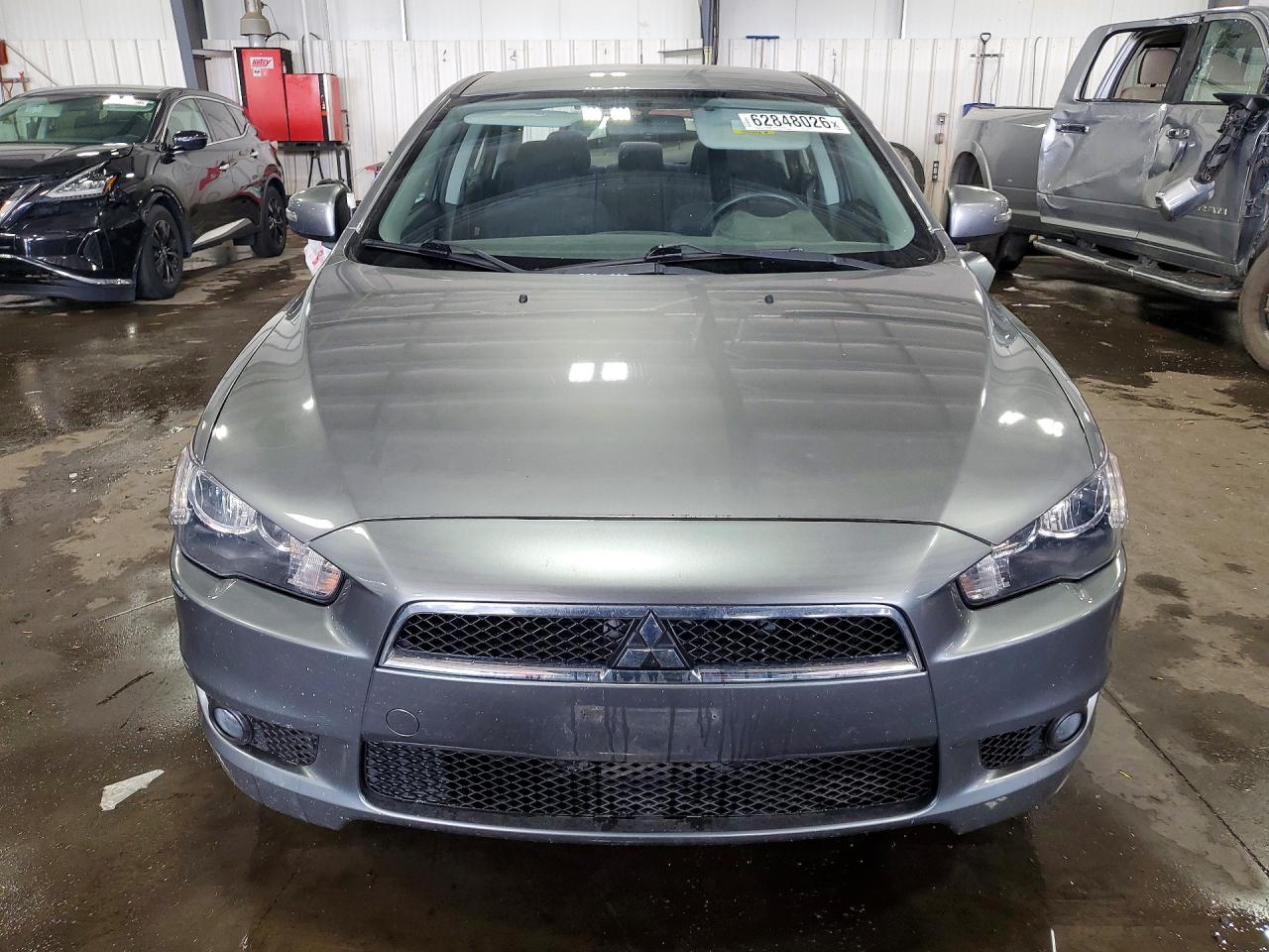 JA32U2FU2FU008717 · 2015 MITSUBISHI LANCER · 5/13