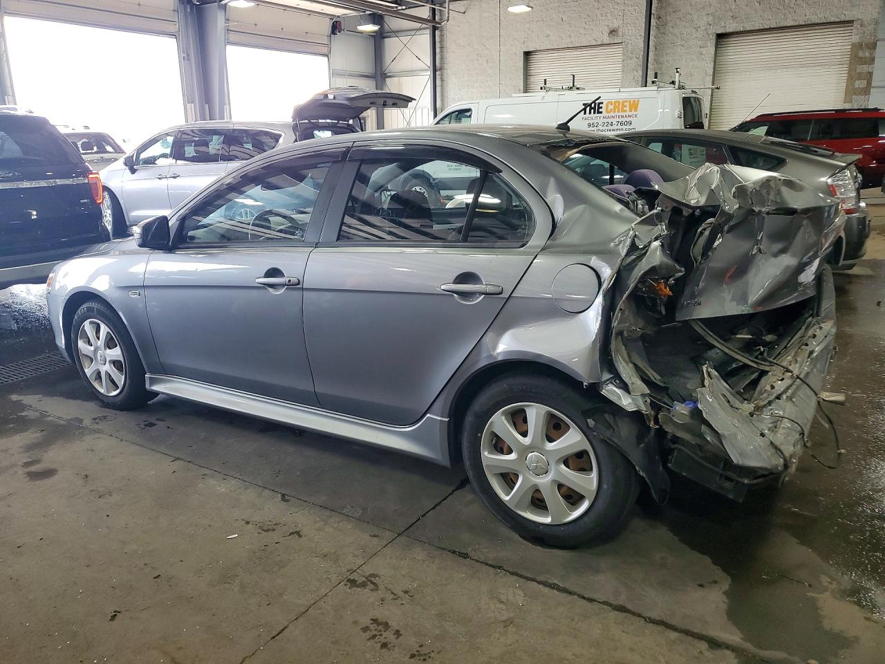 JA32U2FU2FU008717 · 2015 MITSUBISHI LANCER · 2/13