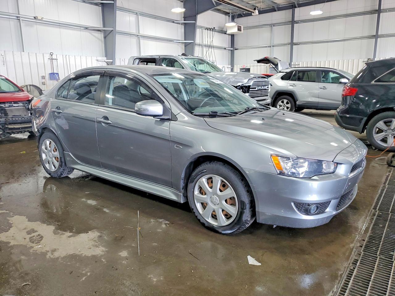 JA32U2FU2FU008717 · 2015 MITSUBISHI LANCER · 4/13
