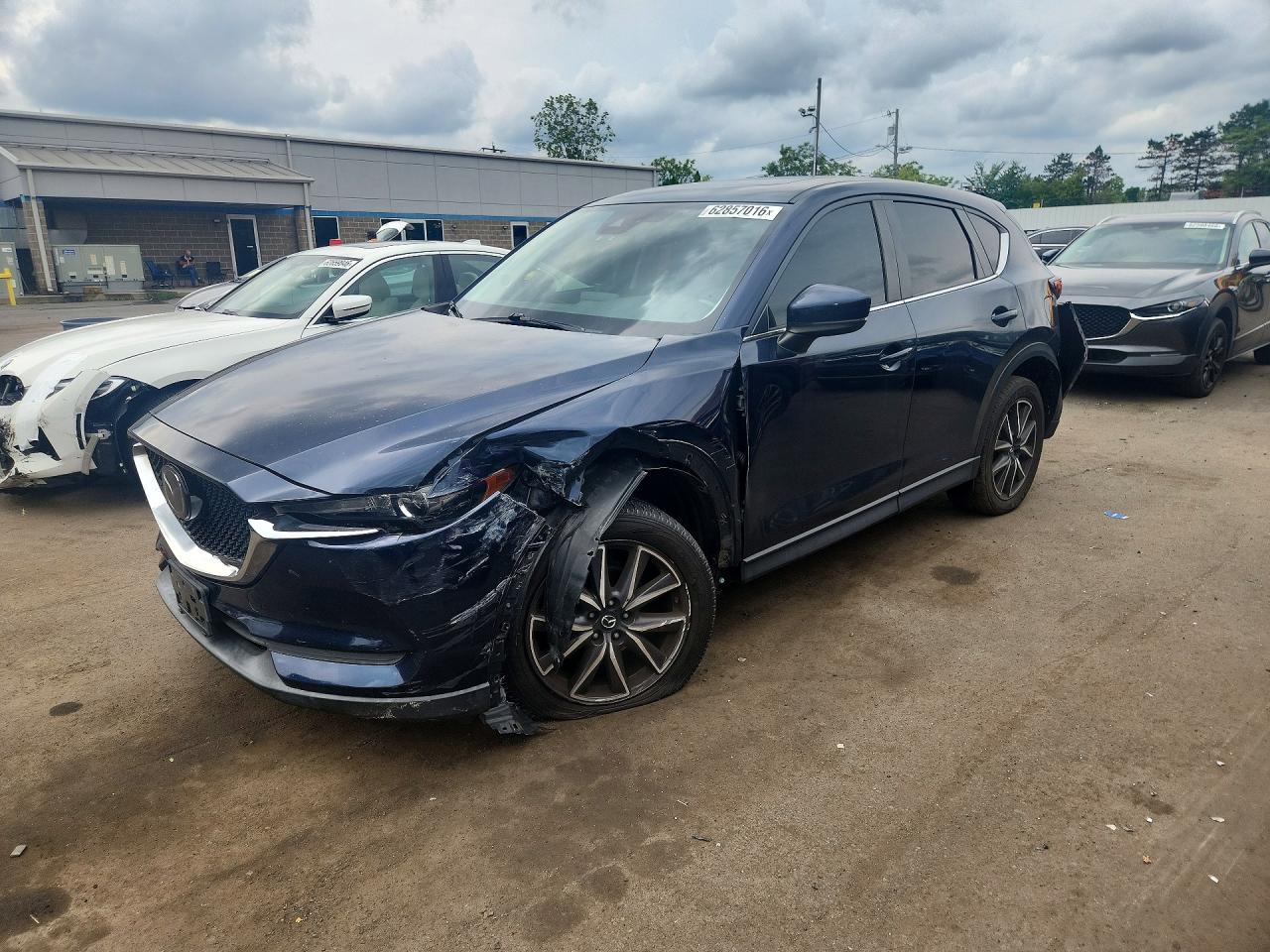JM3KFBCM6J0471306 · 2018 MAZDA CX-5