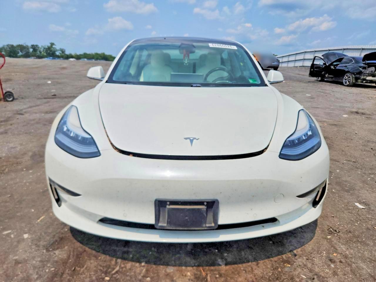 5YJ3E1EA4KF413243 · 2019 TESLA MODEL 3 · 5/12