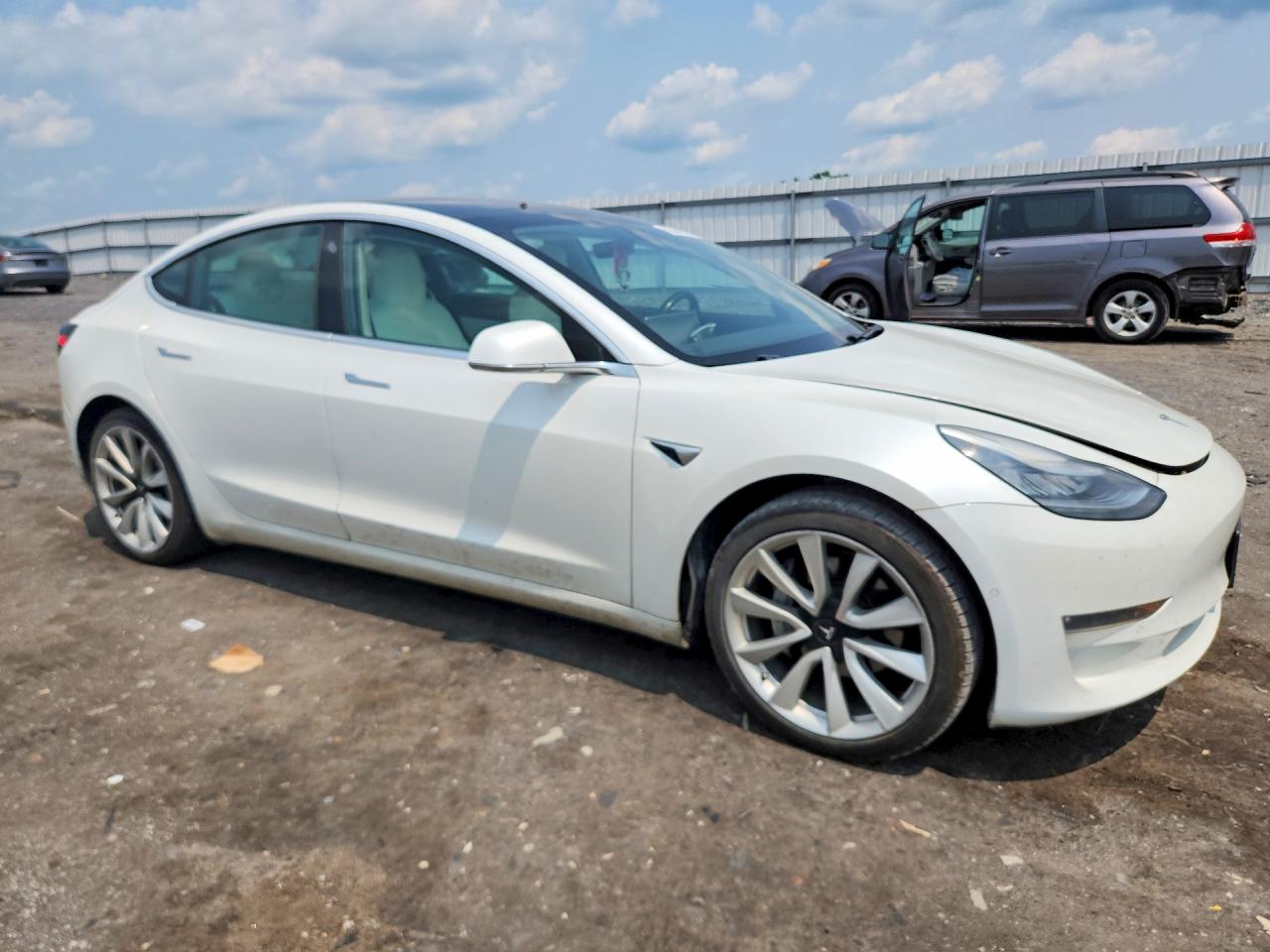 5YJ3E1EA4KF413243 · 2019 TESLA MODEL 3 · 4/12