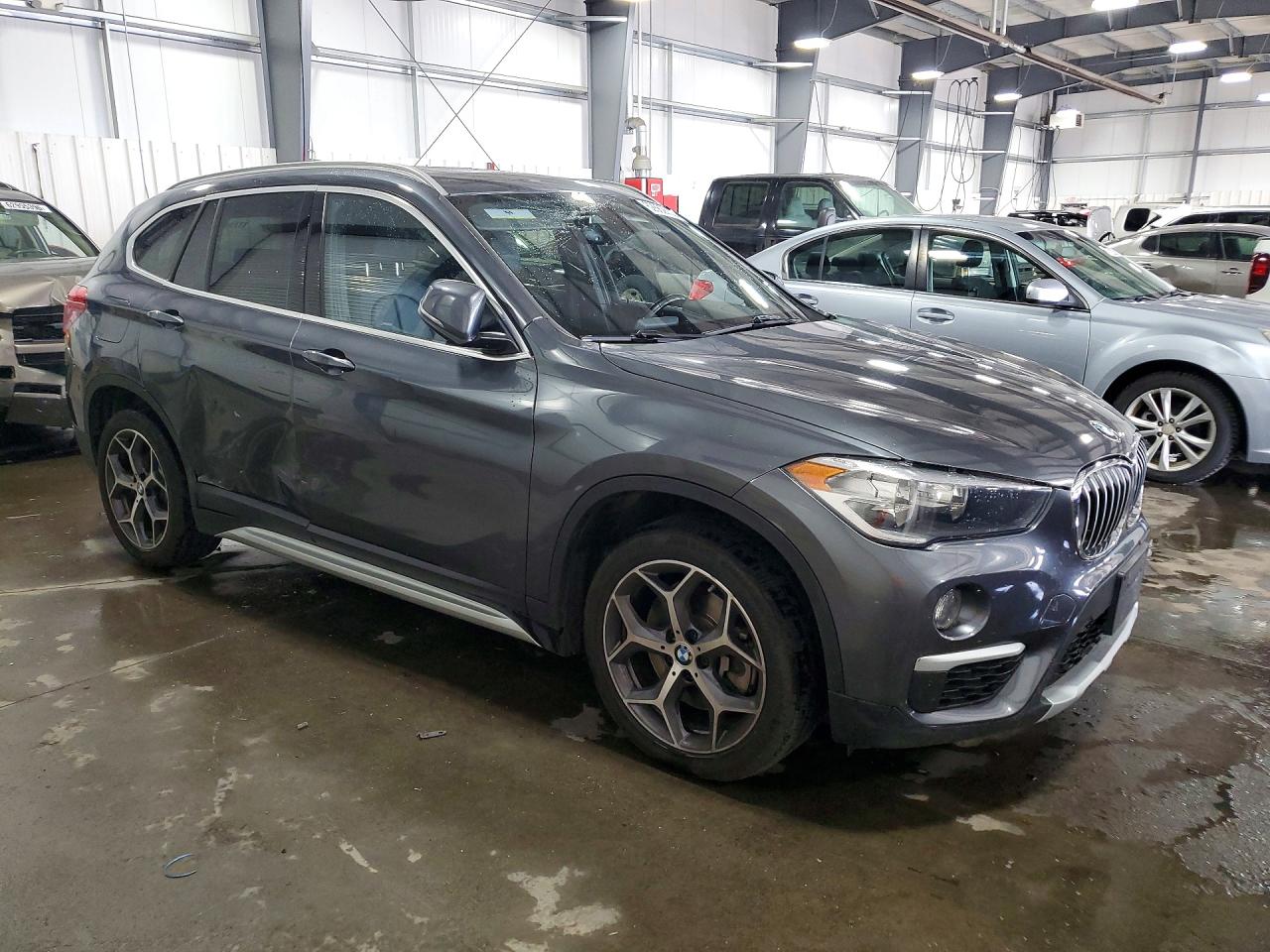 WBXHT3C36J3H33693 · 2018 BMW X1 · 4/13