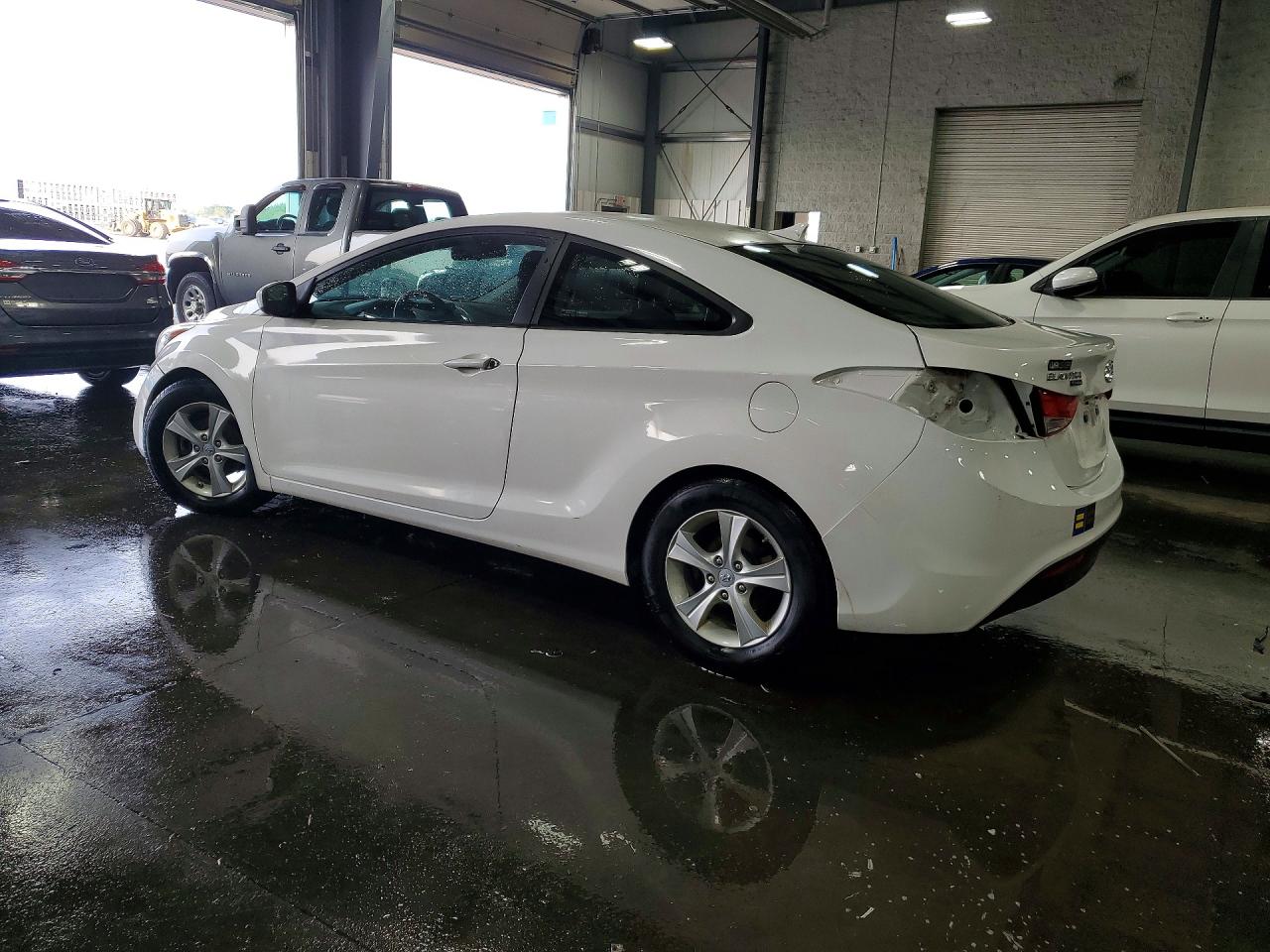 KMHDH6AE9DU018661 · 2013 HYUNDAI ELANTRA COUPE · 2/13