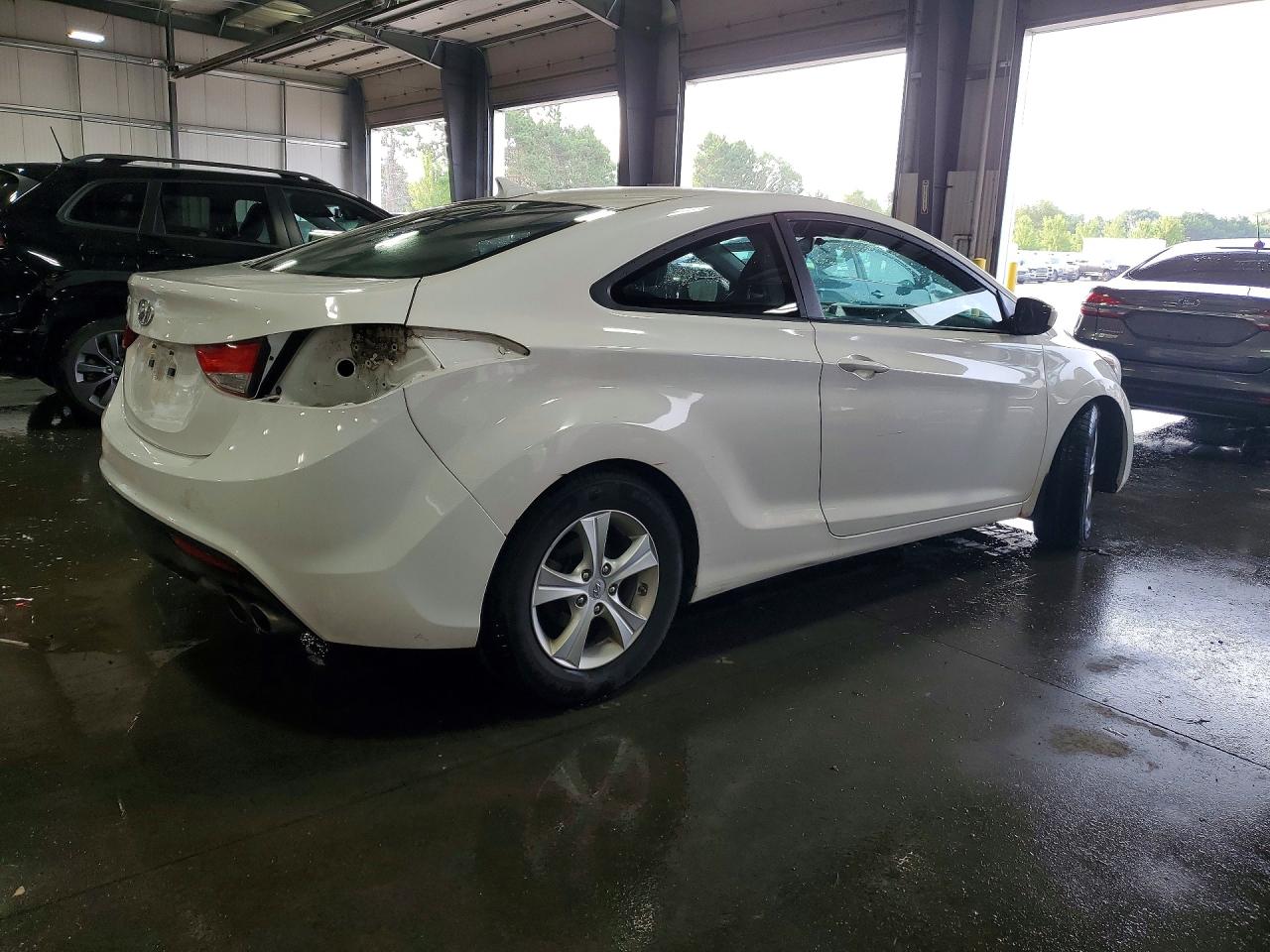 KMHDH6AE9DU018661 · 2013 HYUNDAI ELANTRA COUPE · 3/13