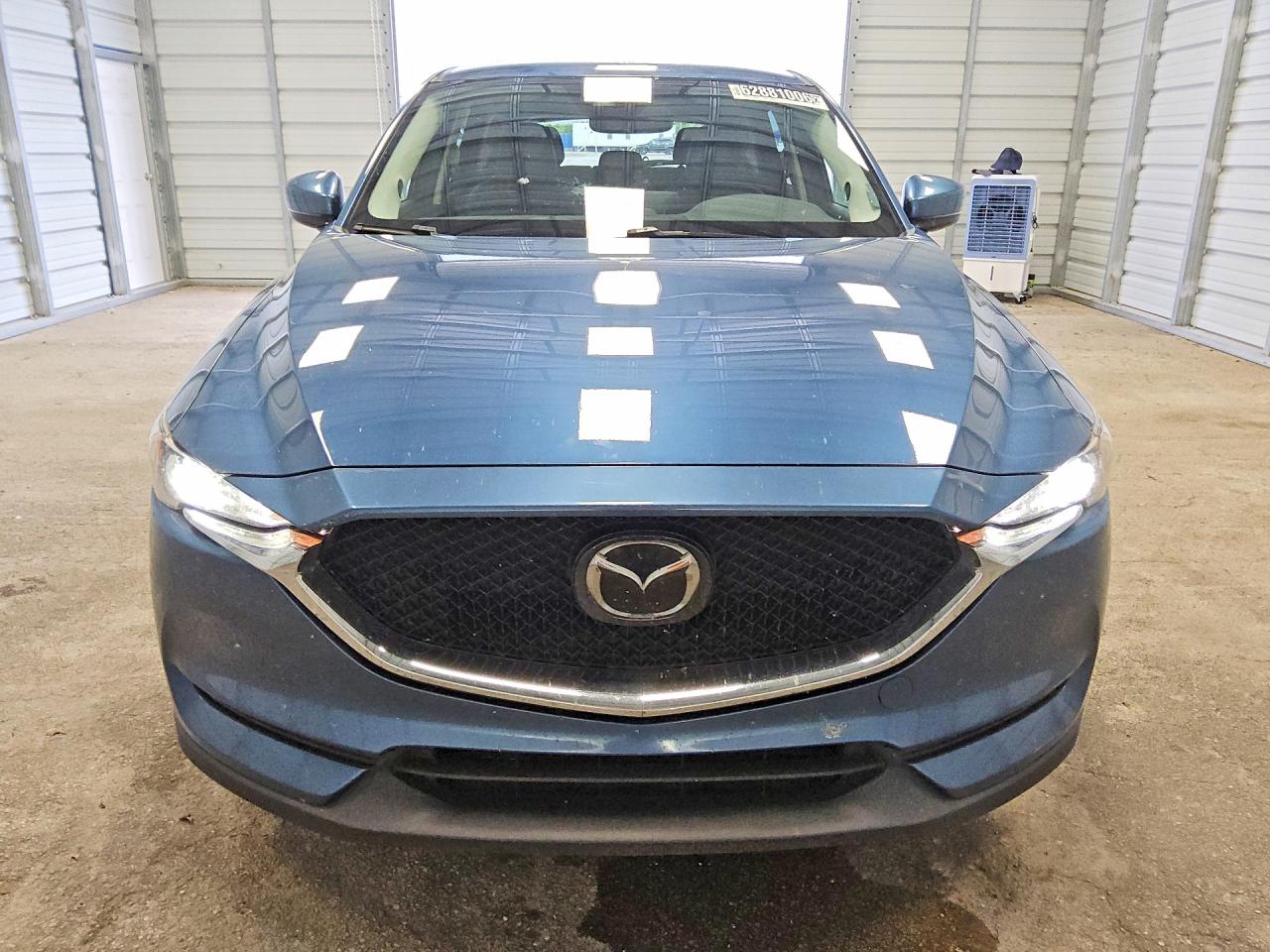 JM3KFACM3M0403334 · 2021 MAZDA CX-5 · 5/12