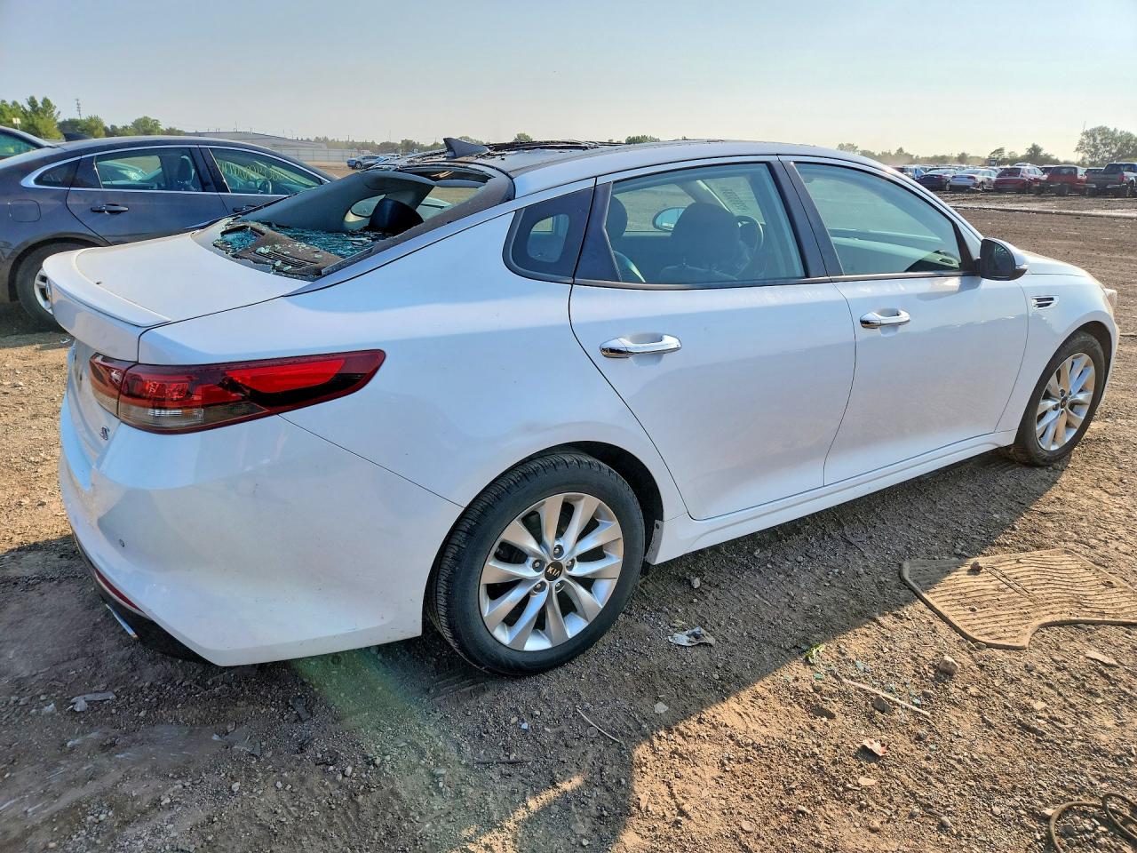 5XXGT4L38JG242165 · 2018 KIA OPTIMA · 3/12