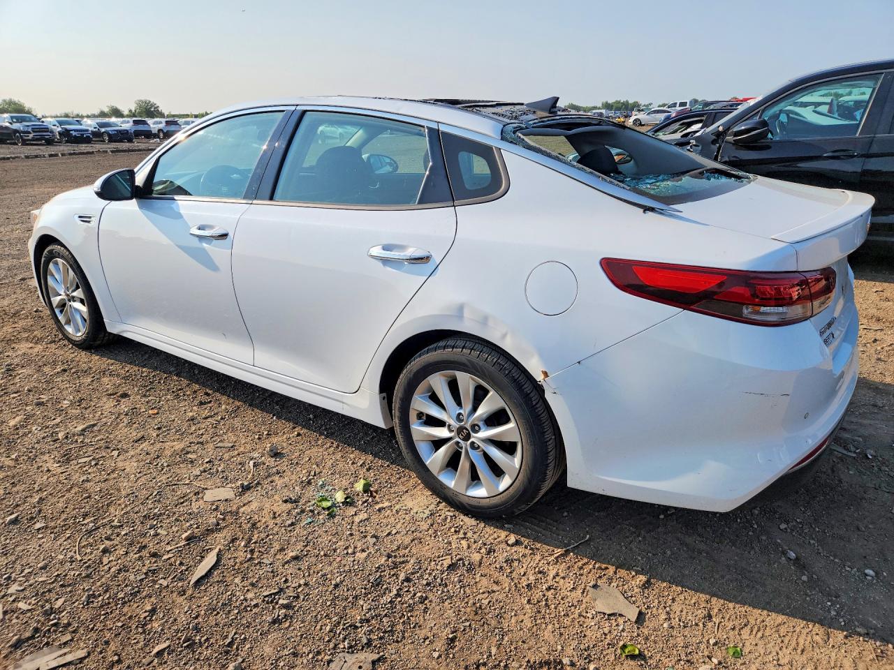 5XXGT4L38JG242165 · 2018 KIA OPTIMA · 2/12