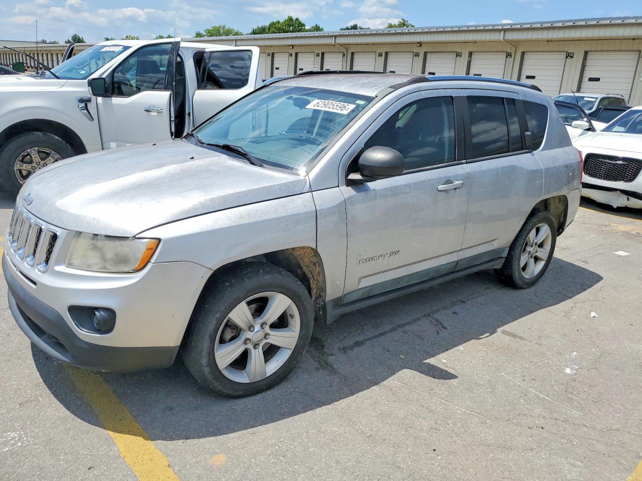 1J4NF1FB8BD219037 · 2011 JEEP COMPASS