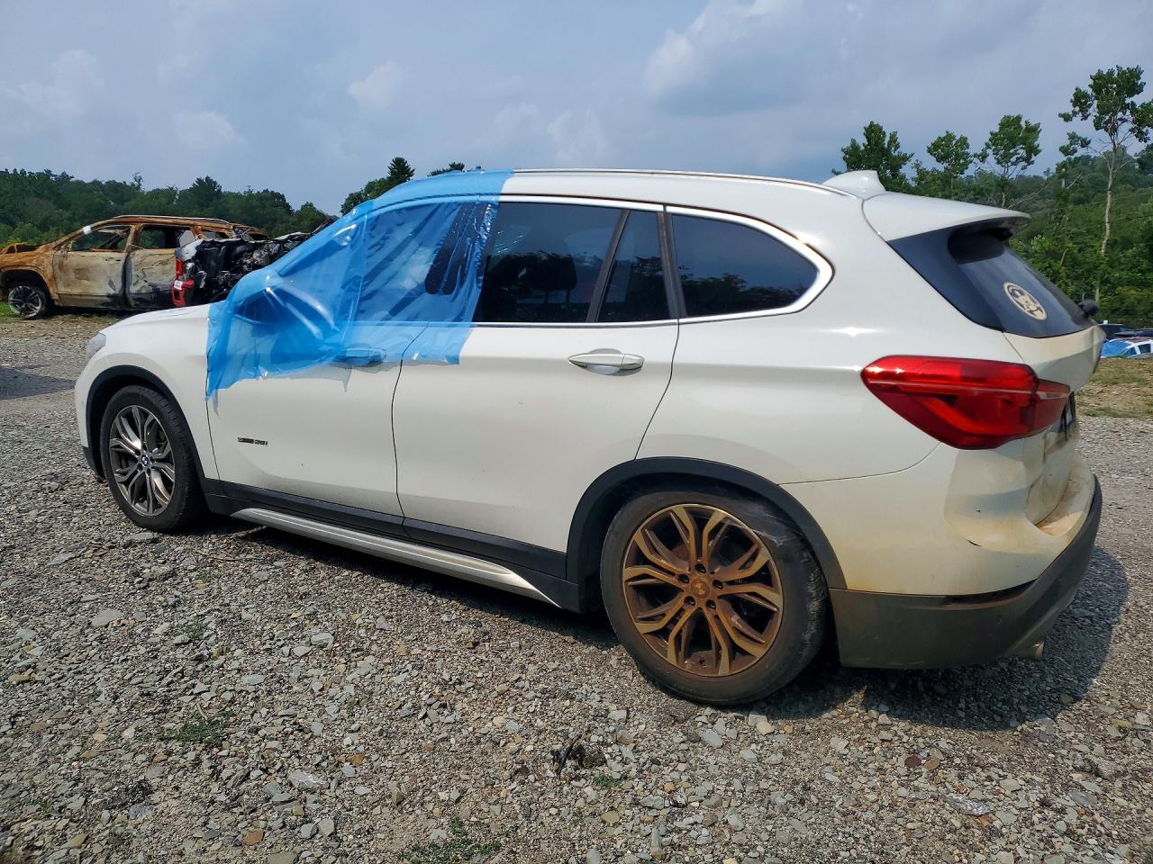 WBXHU7C37H5H37190 · 2017 BMW X1 · 2/13