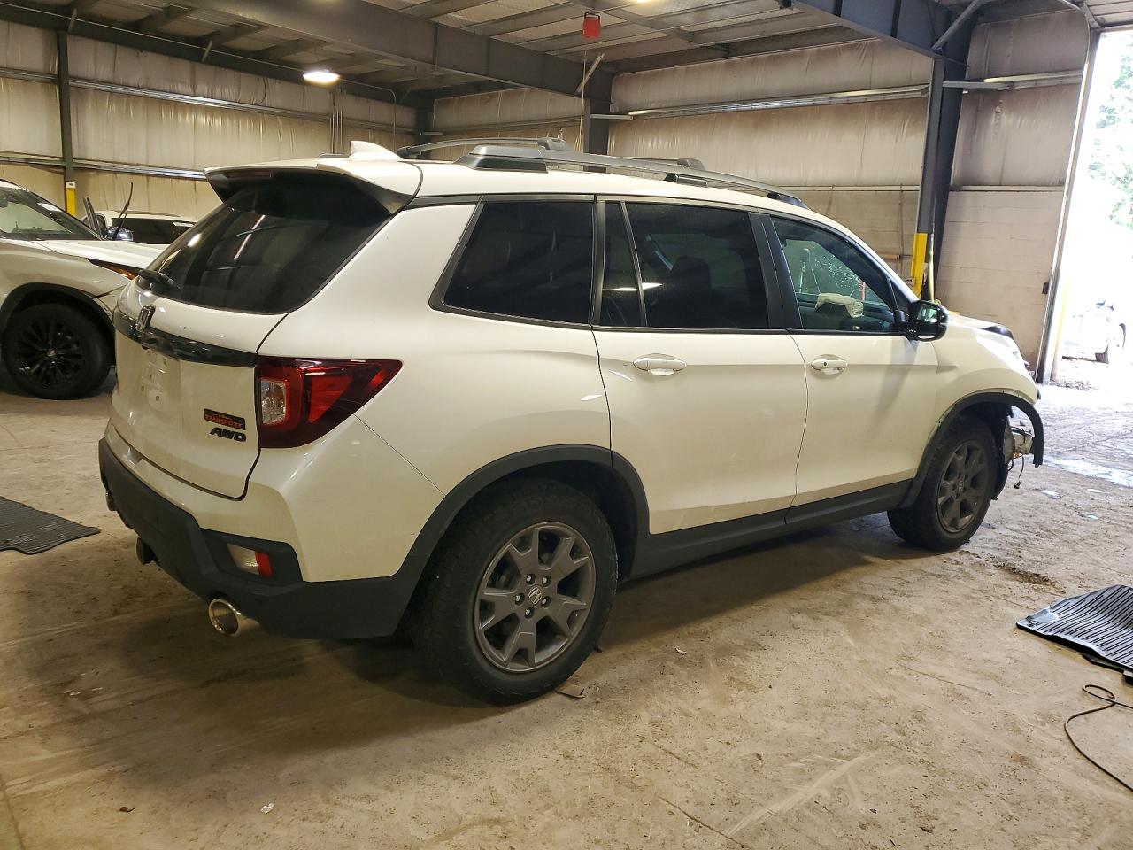 5FNYF8H63RB018922 · 2024 HONDA PASSPORT · 3/14