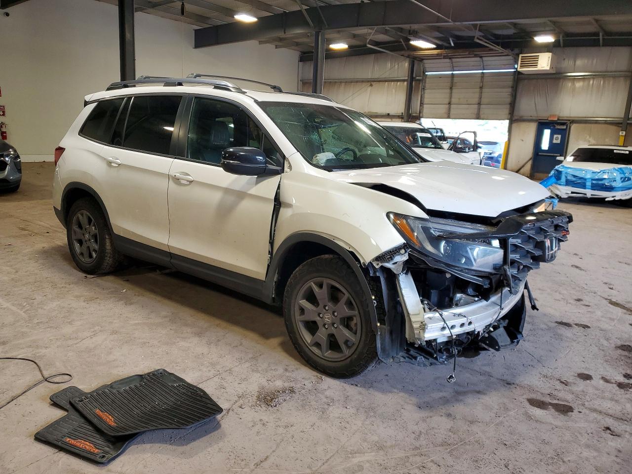 5FNYF8H63RB018922 · 2024 HONDA PASSPORT · 4/14