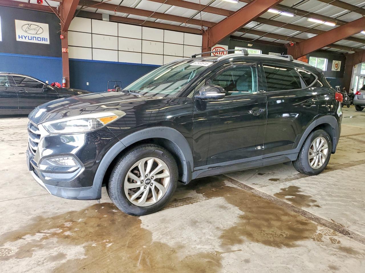 KM8J3CA26GU040563 · 2016 HYUNDAI TUCSON