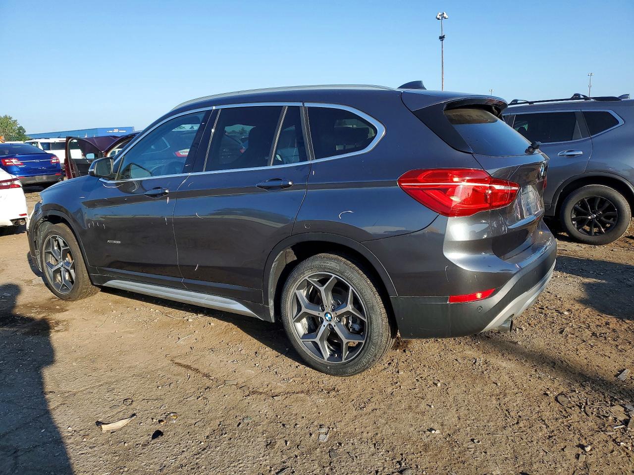 WBXHT3Z3XH4A65618 · 2017 BMW X1 · 2/13
