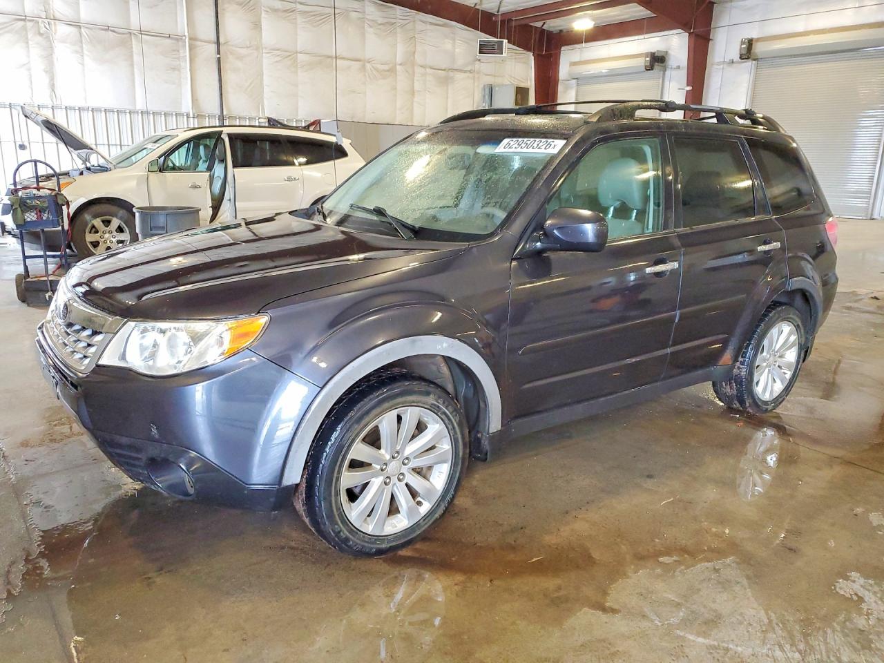 JF2SHAEC2BH763637 · 2011 SUBARU FORESTER