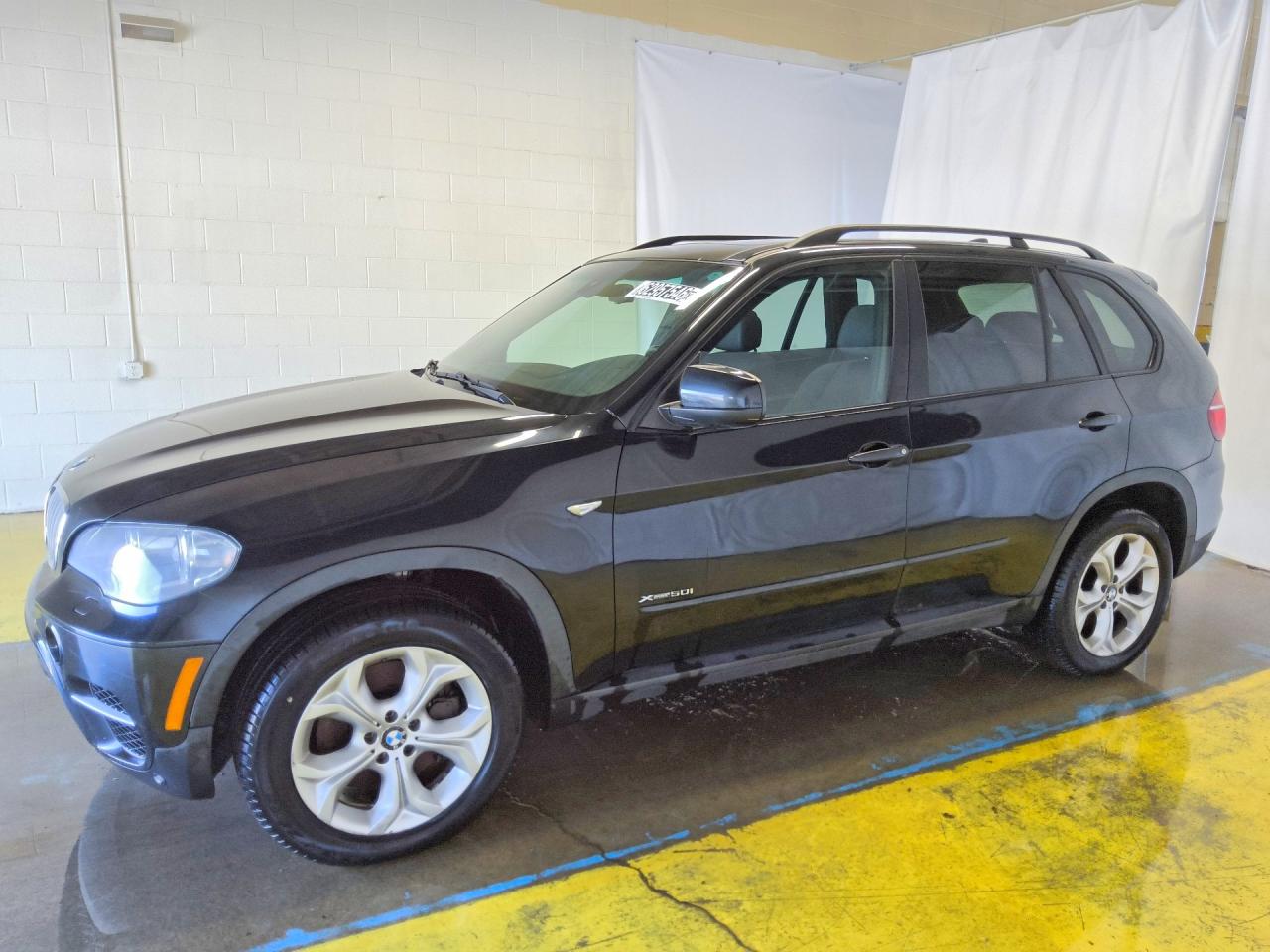5UXZV8C59CL425037 · 2012 BMW X5