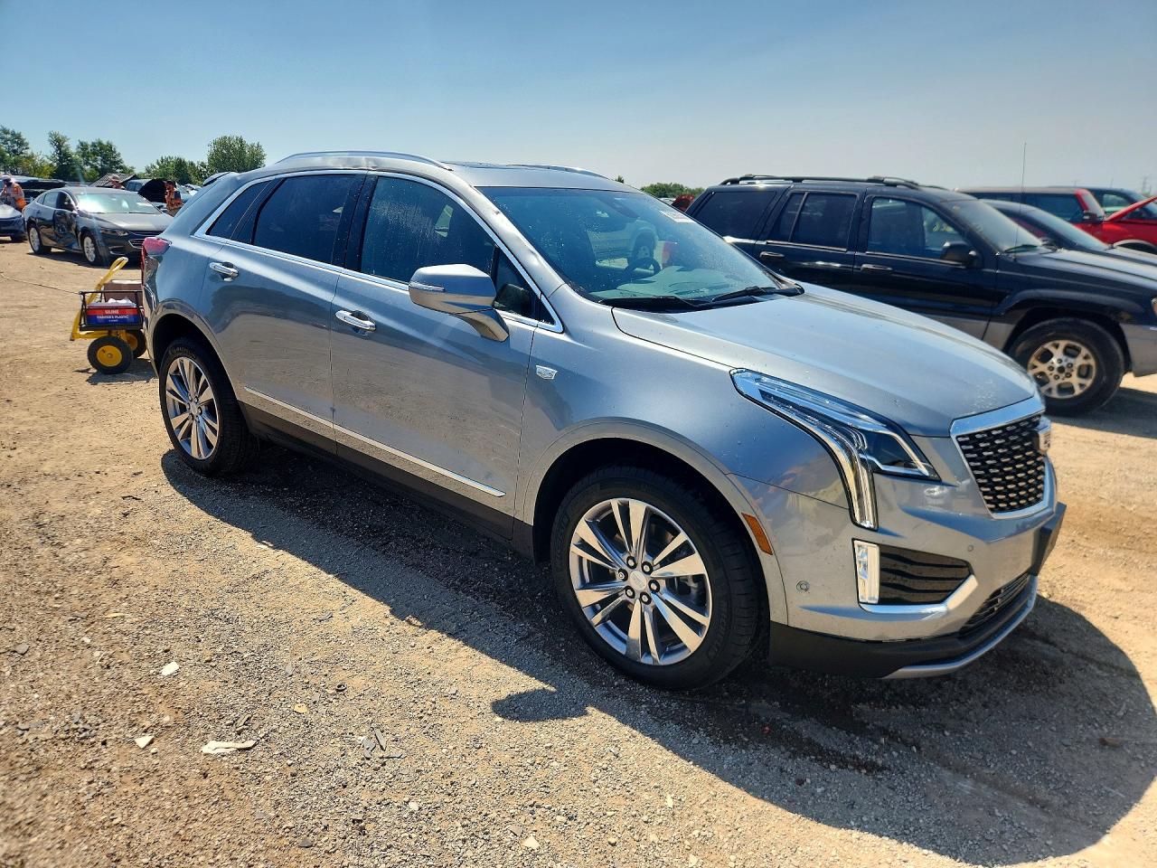 1GYKNDRS3PZ182895 · 2023 CADILLAC XT5 · 4/12