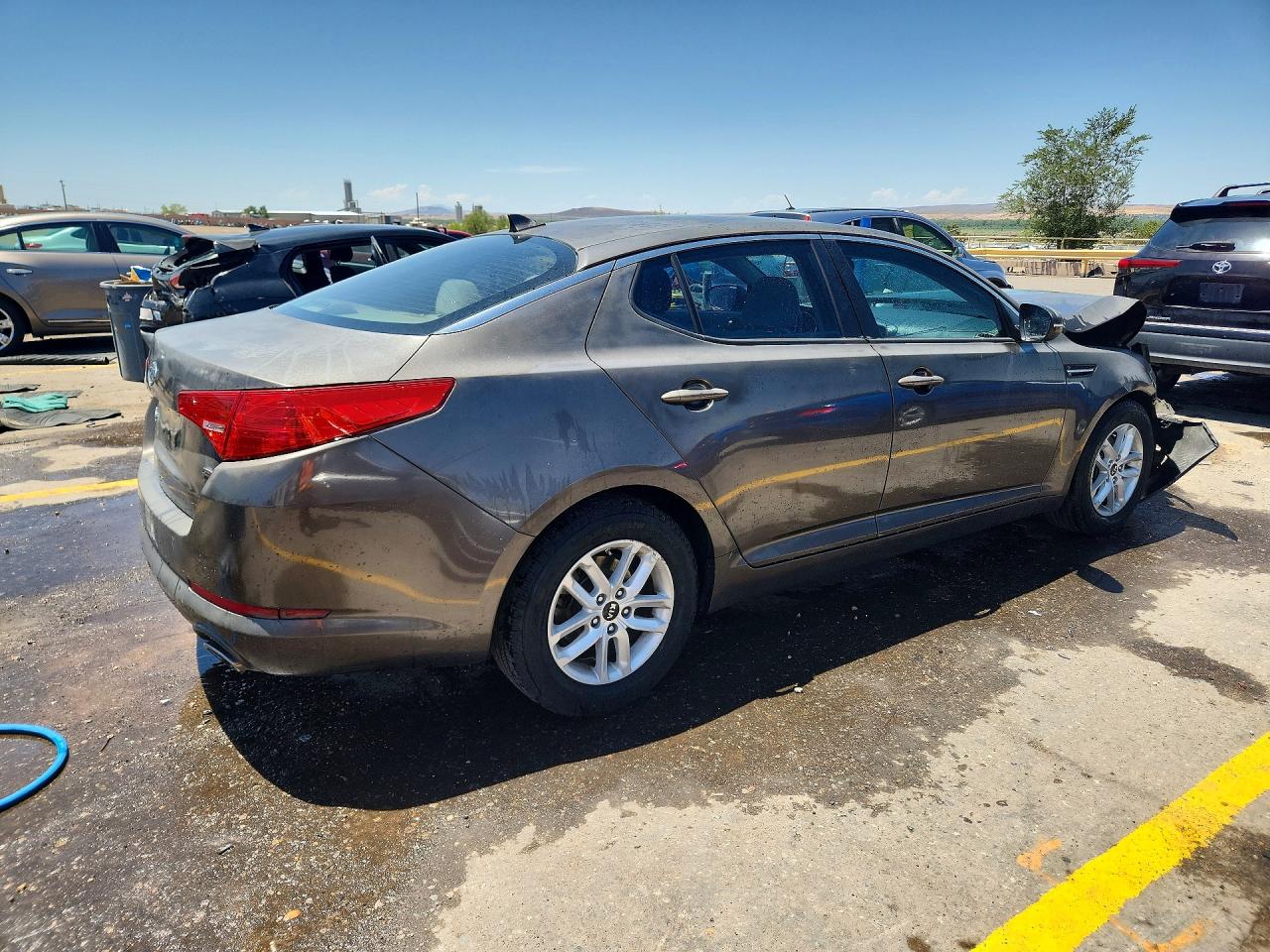 KNAGM4A71B5159814 · 2011 KIA OPTIMA · 3/12