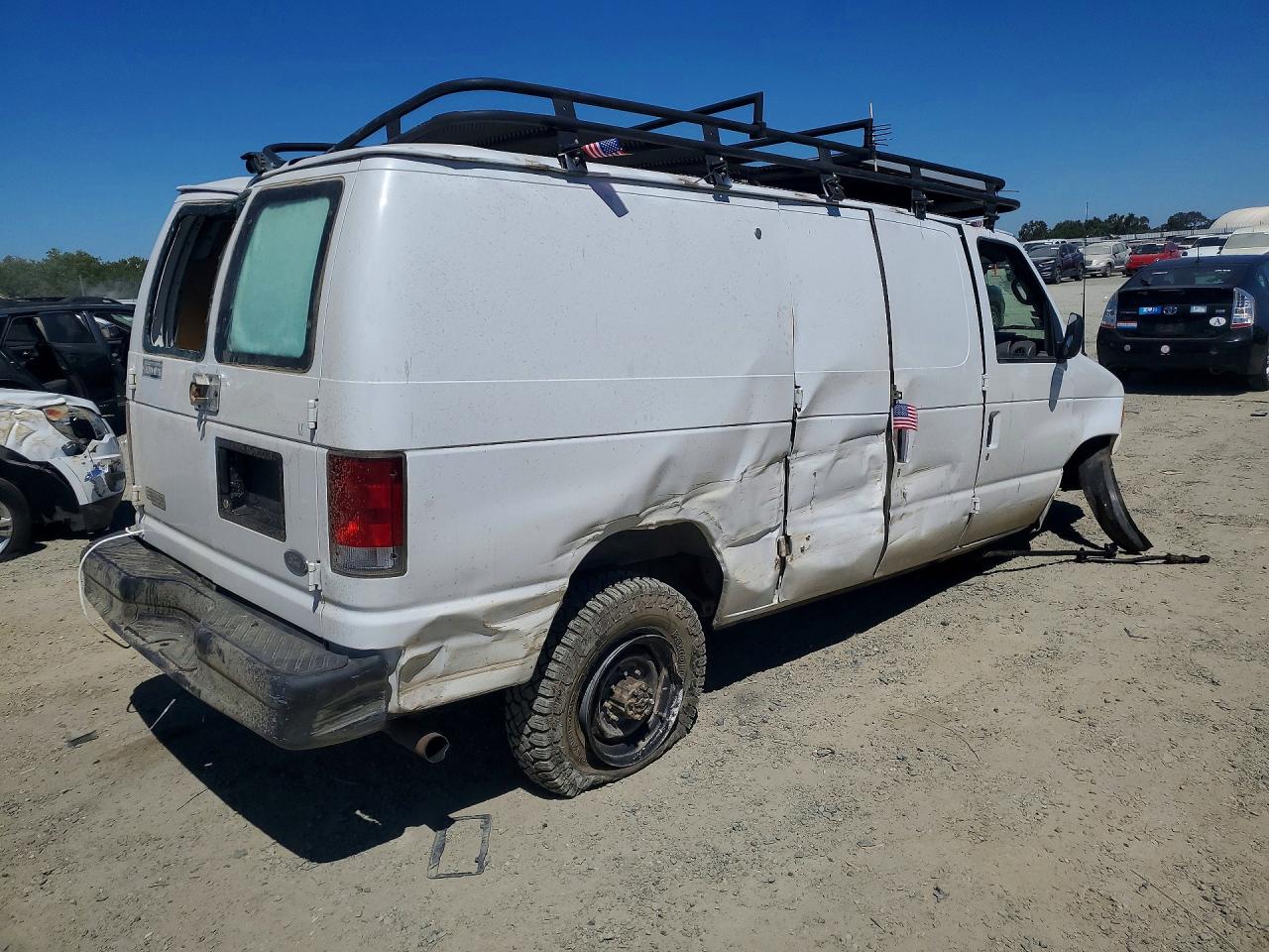 1FTSE34L71HB09543 · 2001 FORD ECONOLINE E350 · 3/13