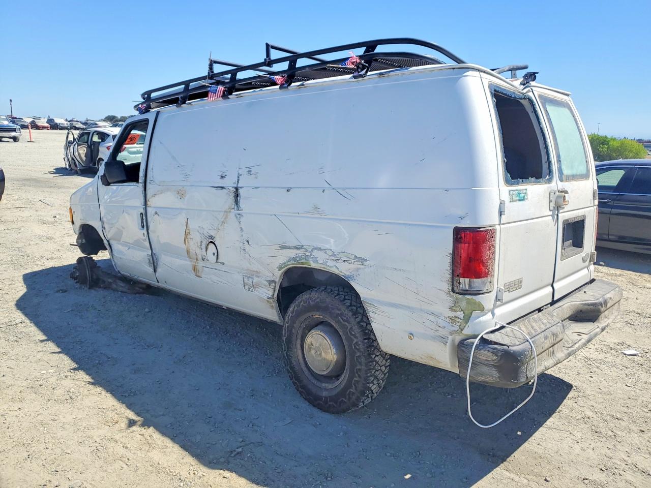 1FTSE34L71HB09543 · 2001 FORD ECONOLINE E350 · 2/13
