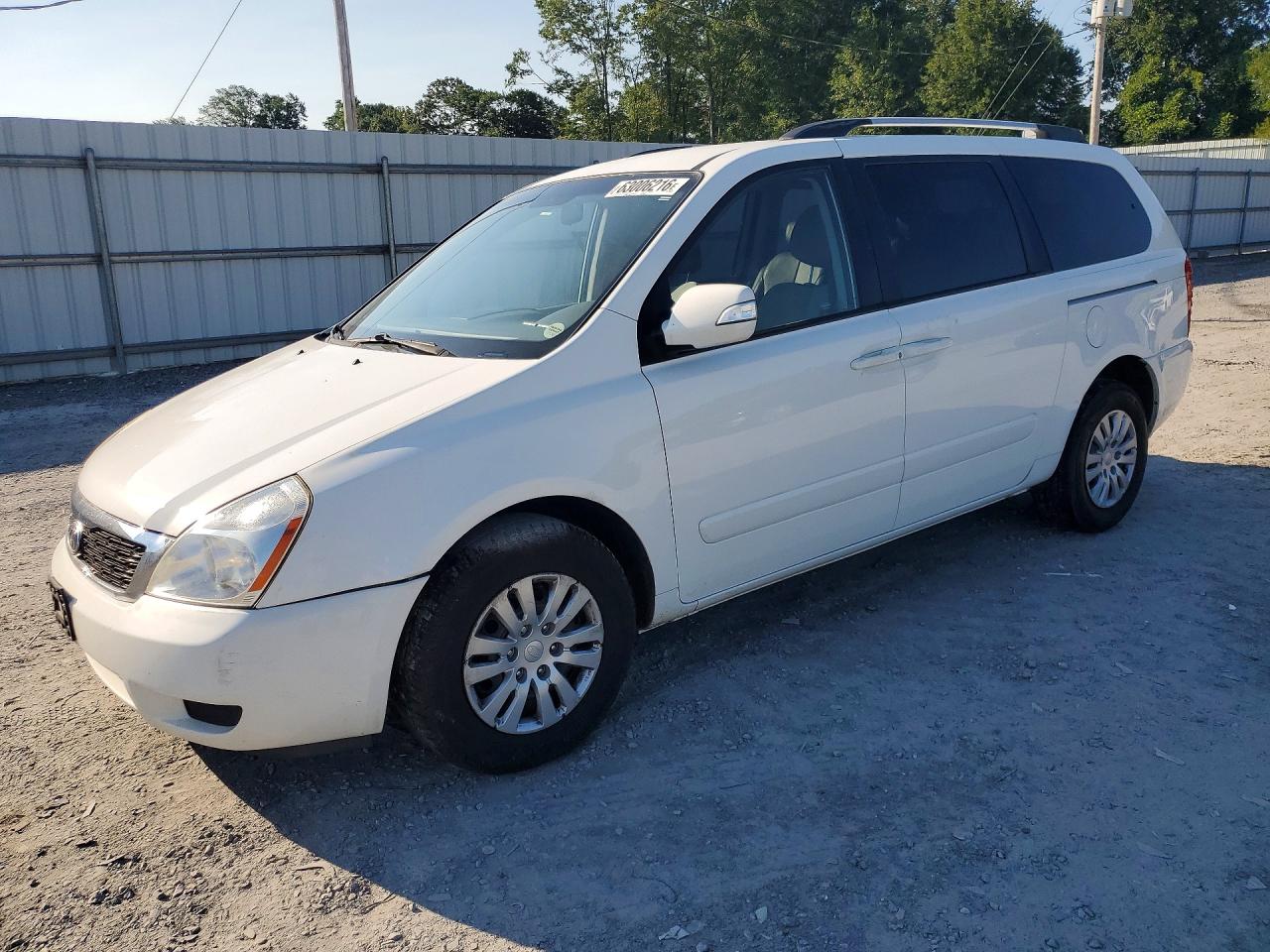 KNDMG4C75C6440584 · 2012 KIA SEDONA