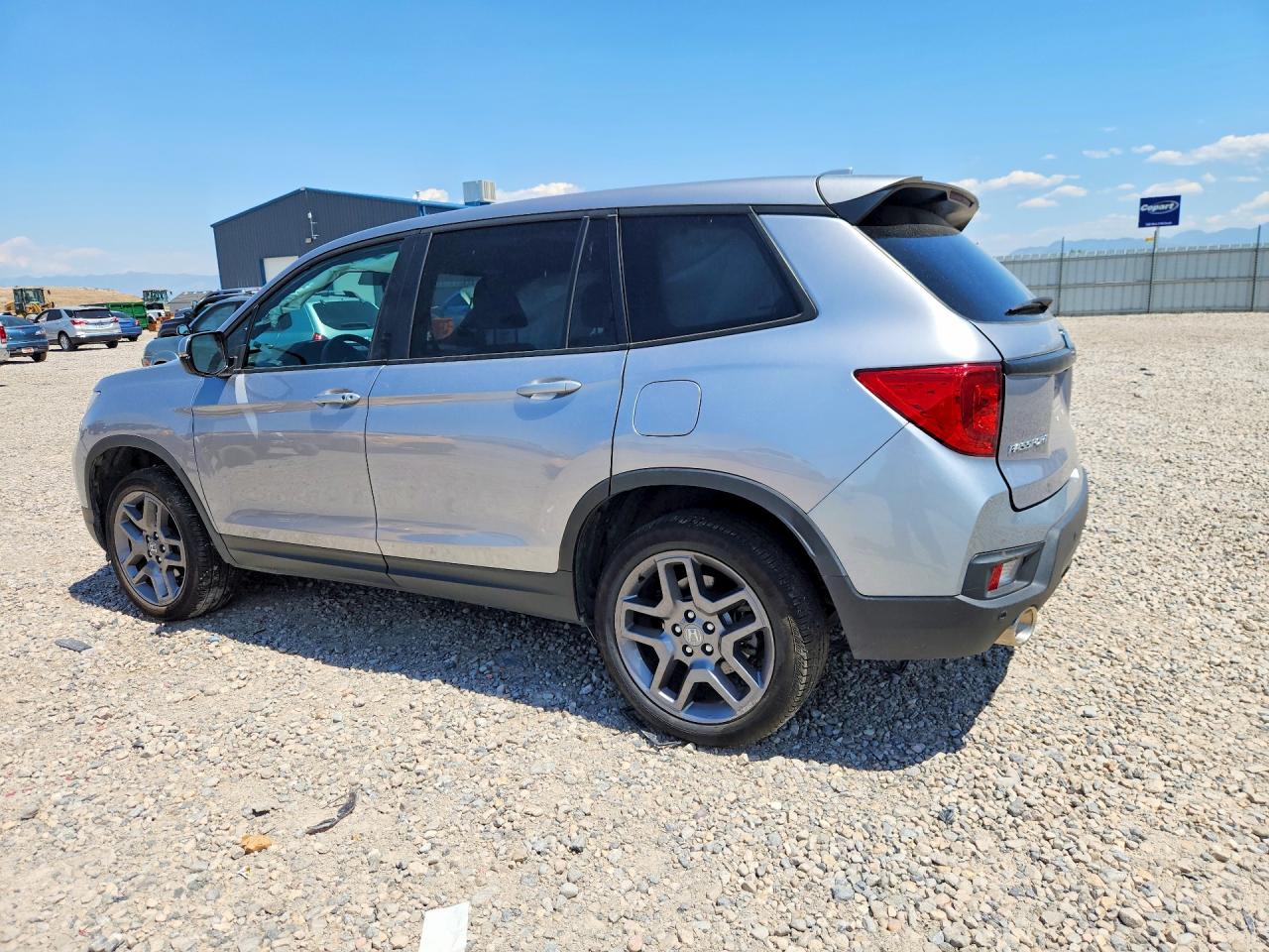 5FNYF8H52PB032671 · 2023 HONDA PASSPORT · 2/12