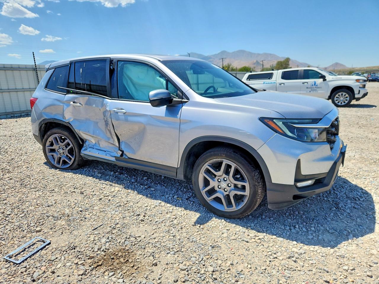 5FNYF8H52PB032671 · 2023 HONDA PASSPORT · 4/12