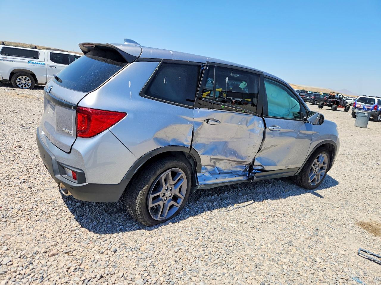 5FNYF8H52PB032671 · 2023 HONDA PASSPORT · 3/12