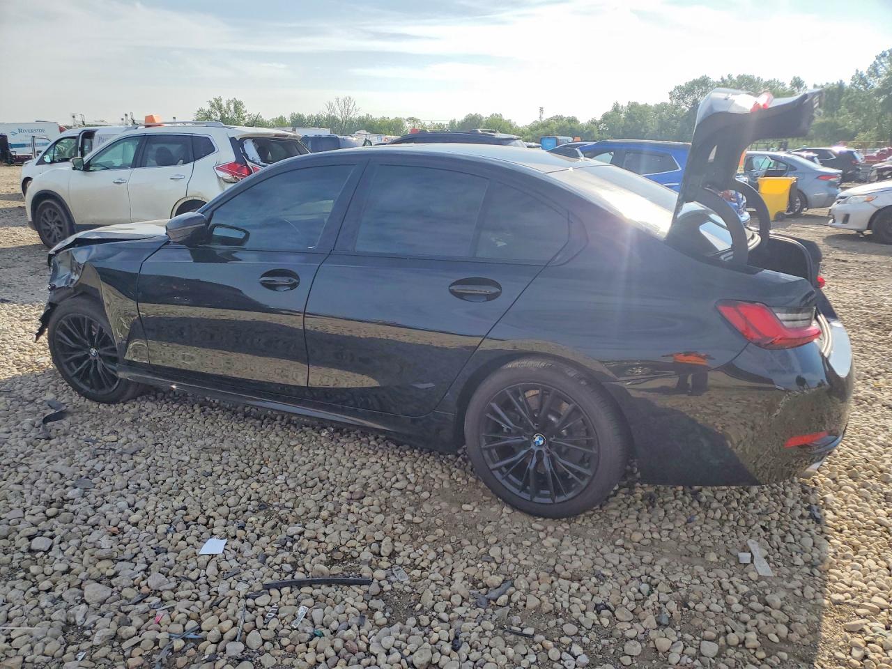3MW89FF03P8D14841 · 2023 BMW 330XI · 2/12