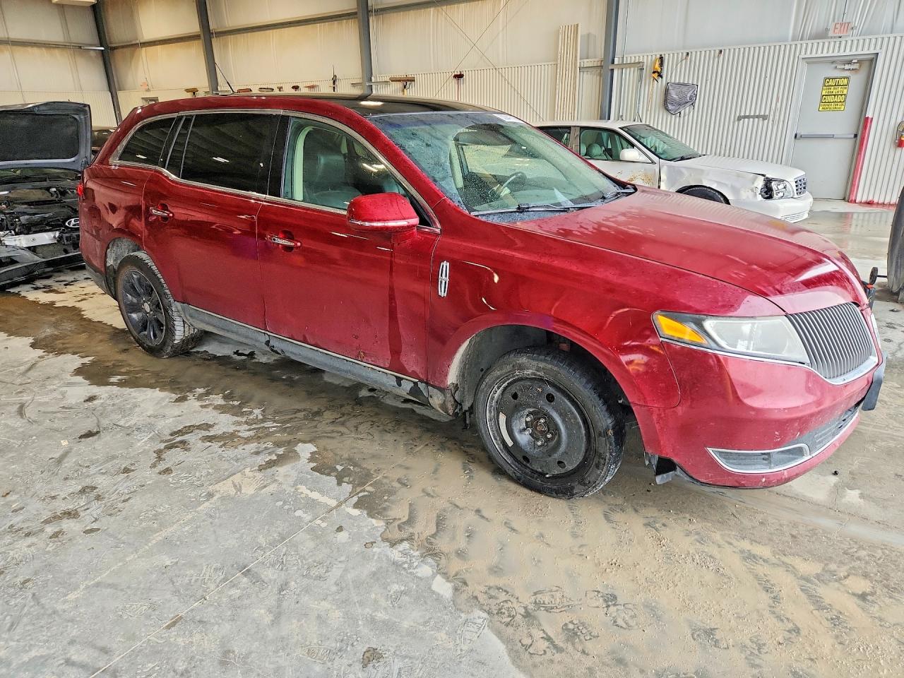 2LMHJ5FK8FBL03881 · 2015 LINCOLN MKT · 4/12