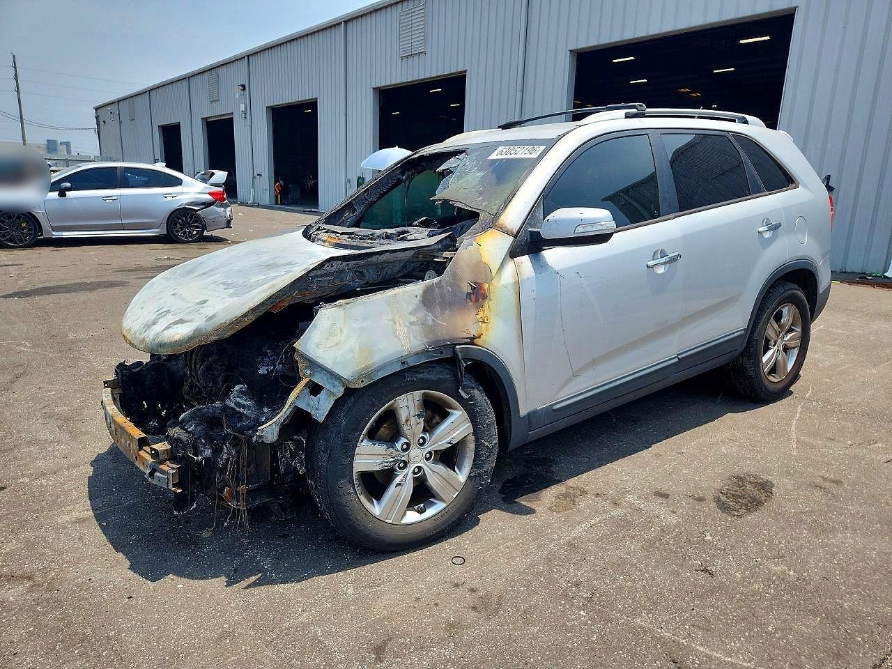5XYKU3A68CG306461 · 2012 KIA SORENTO