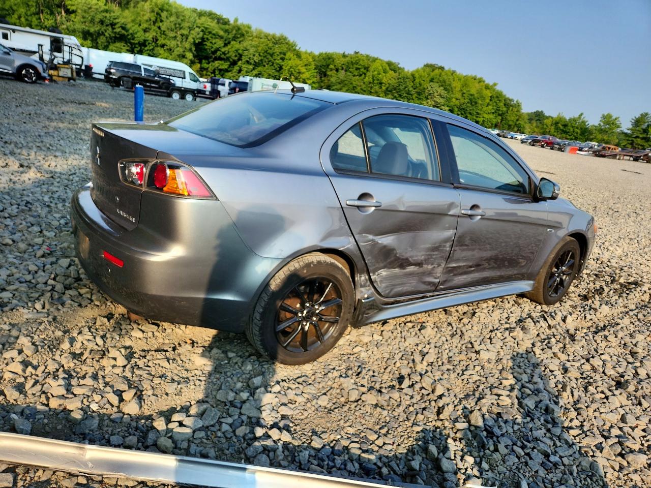 JA32U2FU6FU018571 · 2015 MITSUBISHI LANCER · 3/13